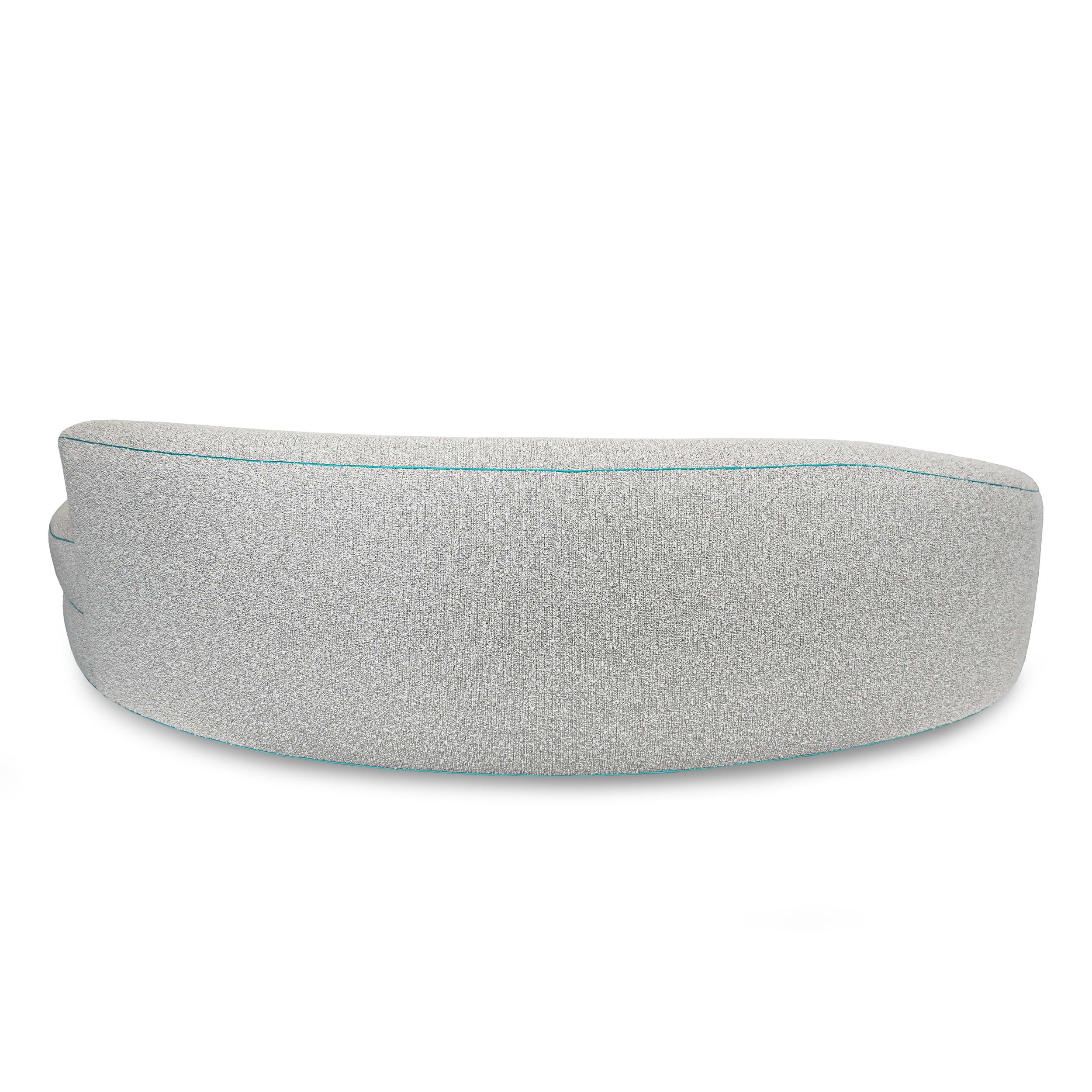 https://a.1stdibscdn.com/boucle-curved-sofa-with-turquoise-accents-for-sale-picture-13/f_21233/1622750929318/17_master.jpg