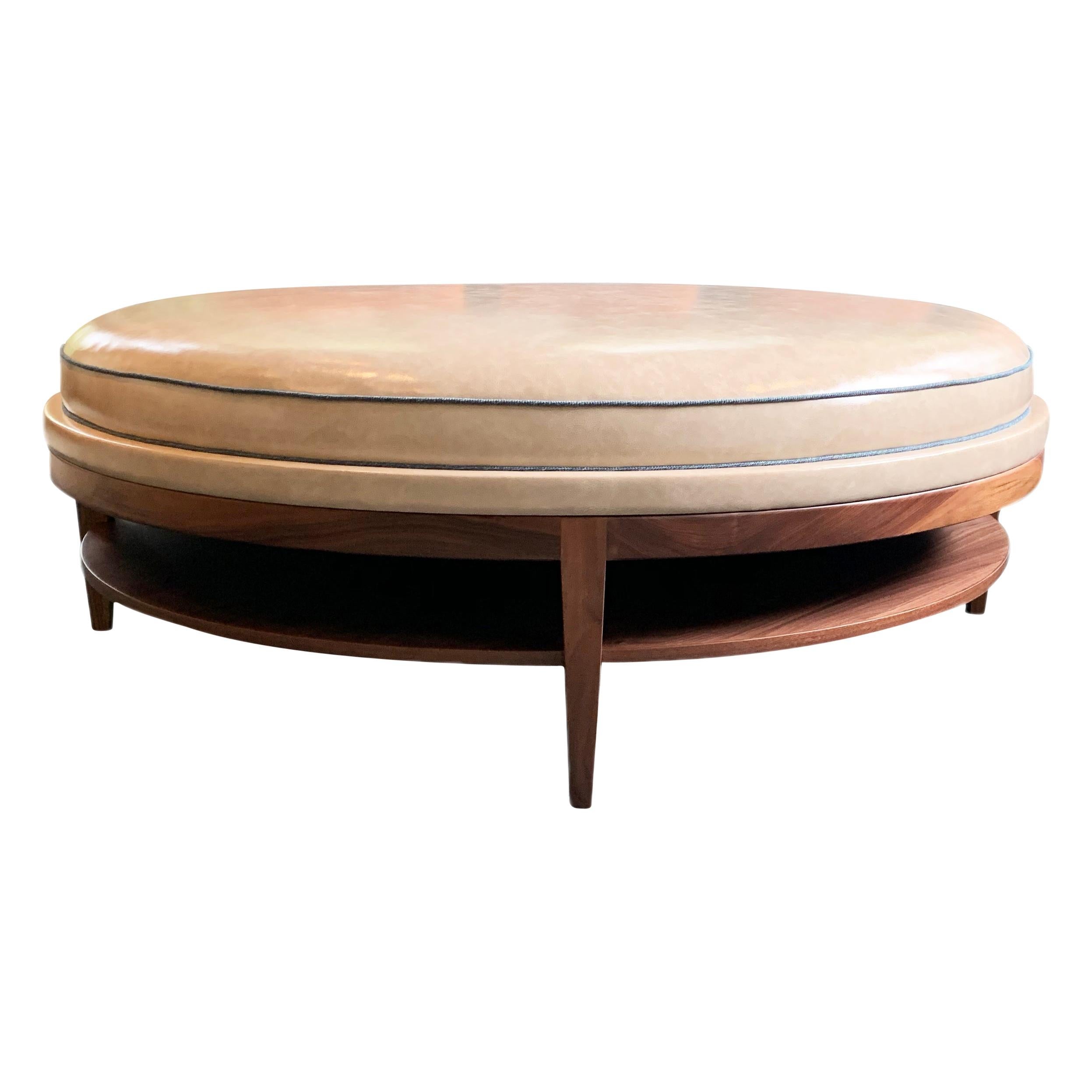 https://a.1stdibscdn.com/round-cushioned-top-coffee-table-with-storage-for-sale/1121189/f_181299821582954133051/18129982_master.jpg