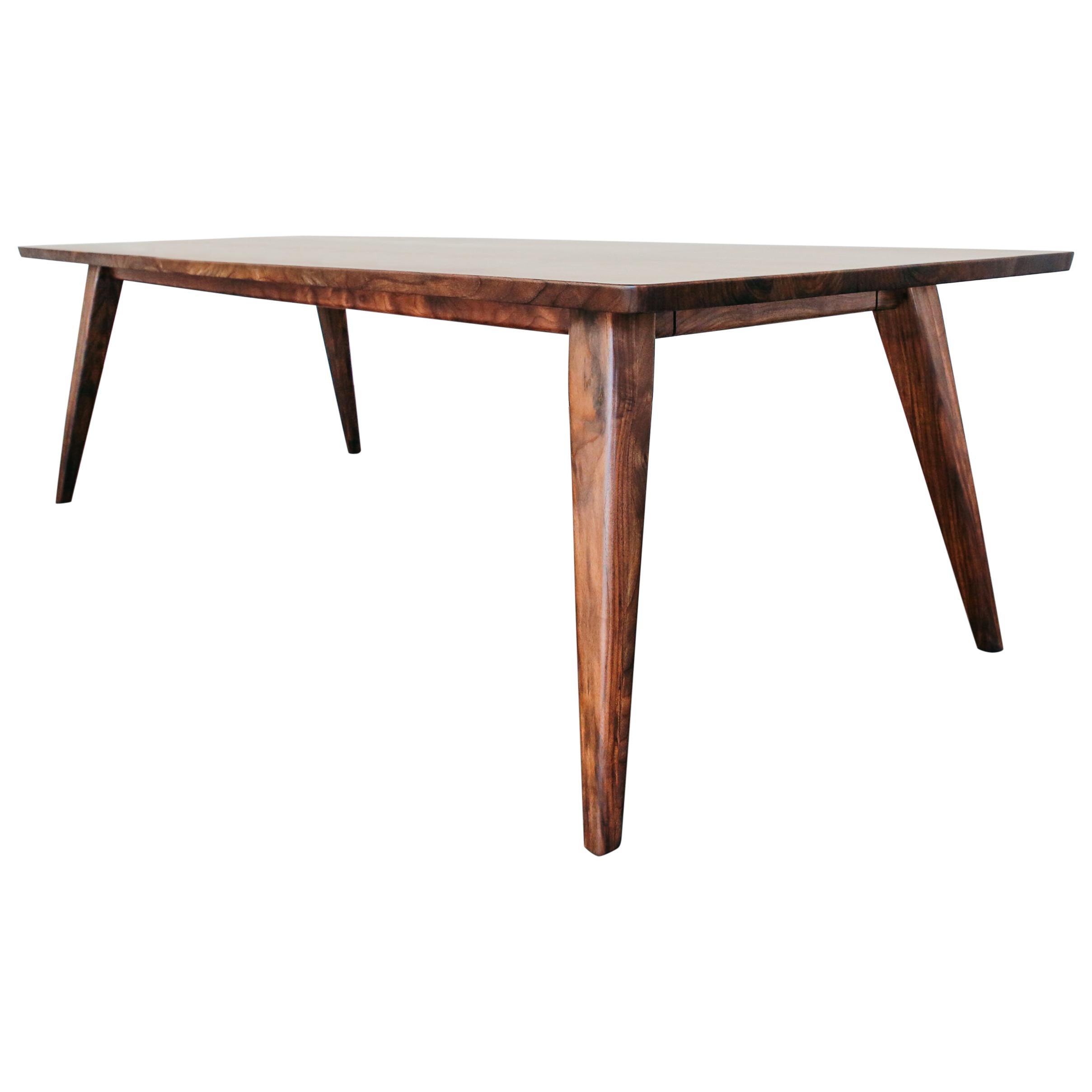 https://a.1stdibscdn.com/120-columbia-dining-table-in-oregon-walnut-by-studio-moe-for-sale/1121189/f_183263421584764823739/18326342_master.jpg