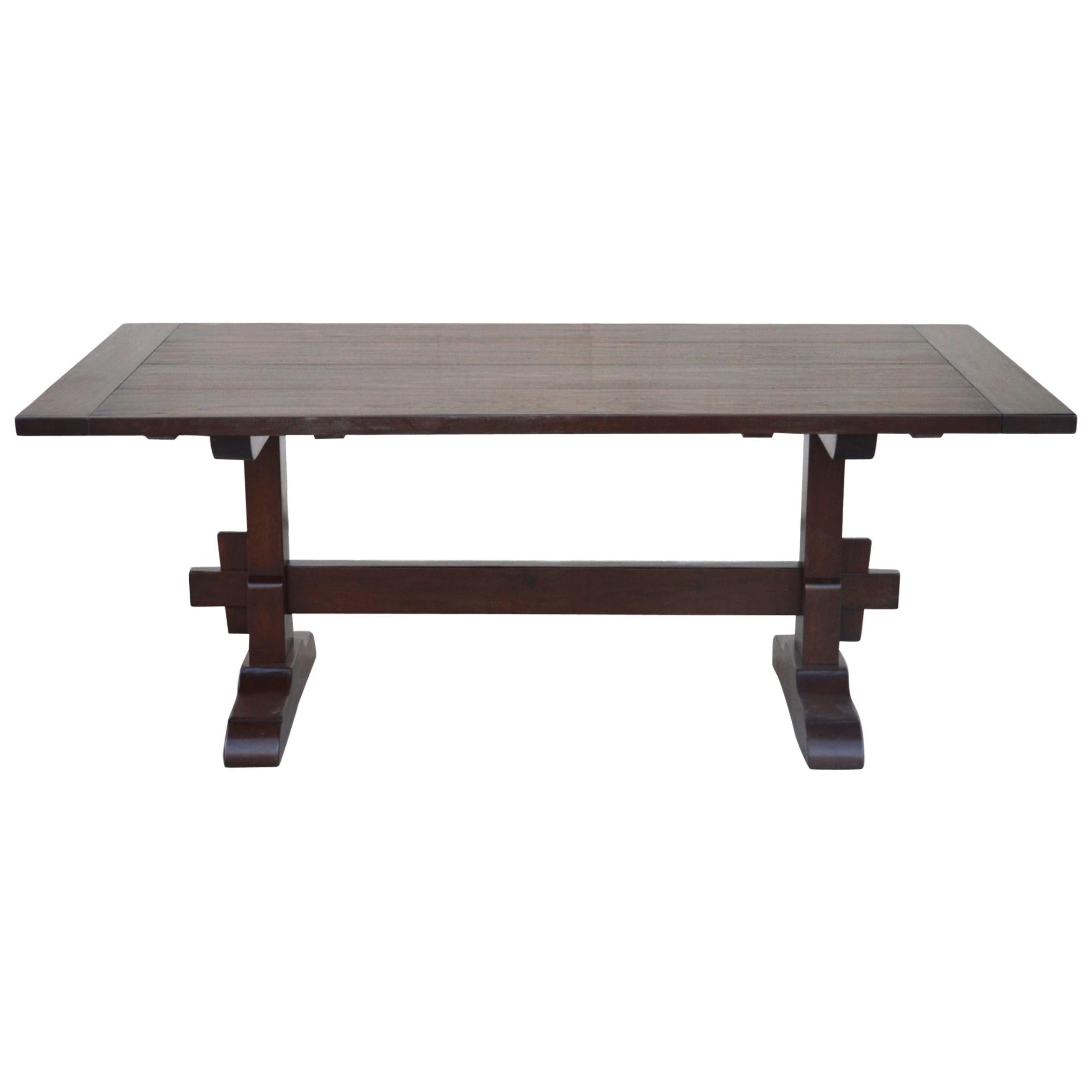 https://a.1stdibscdn.com/expandable-trestle-table-made-from-walnut-for-sale/1121189/f_184653821585671134070/18465382_master.jpg