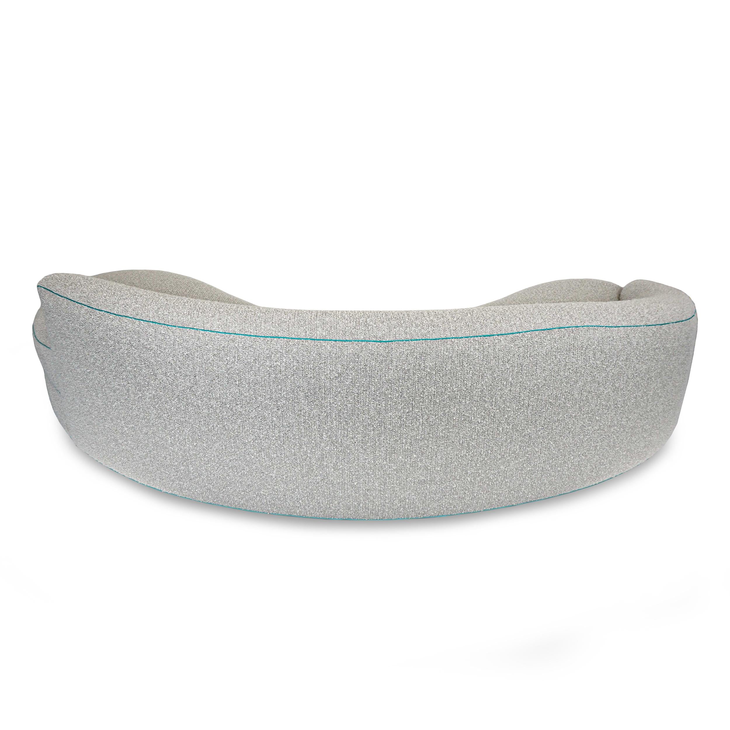 https://a.1stdibscdn.com/boucle-curved-sofa-with-turquoise-accents-for-sale-picture-14/f_21233/1622750932398/18_master.jpg