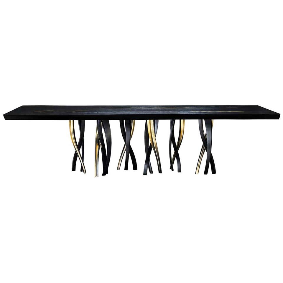 https://a.1stdibscdn.com/black-and-gold-ashwood-dining-table-made-in-italy-in-stock-in-los-angeles-for-sale/1121189/f_190599221589520091170/19059922_master.jpg