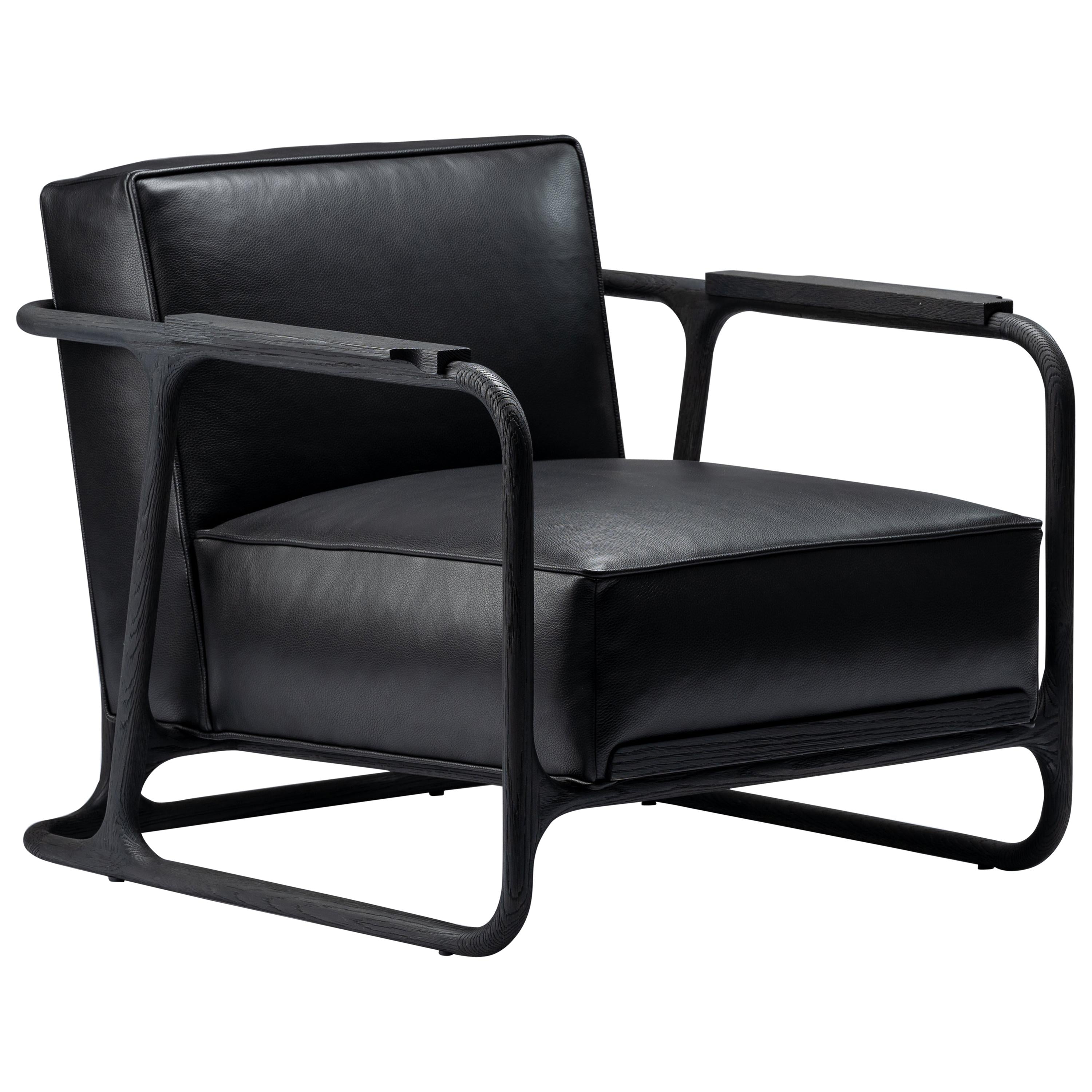 https://a.1stdibscdn.com/alfred-black-lounge-chair-armchair-in-walnut-oak-w-leather-seat-by-mandy-graham-for-sale/1121189/f_193291921594462028838/19329192_master.jpg