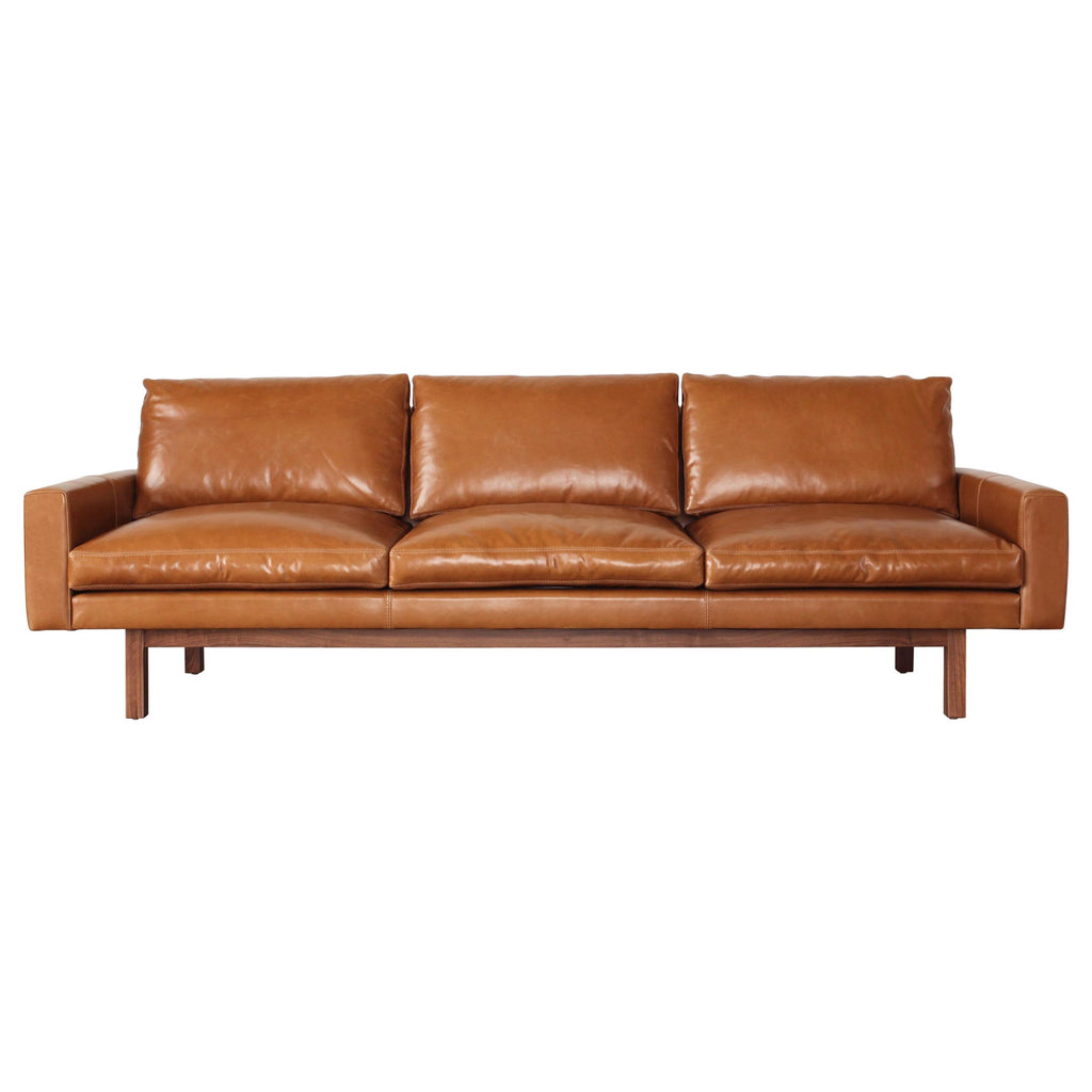 https://a.1stdibscdn.com/contemporary-x-large-standard-sofa-in-caramel-leather-with-walnut-base-for-sale/1121189/f_196154721593241323942/19615472_master.jpg
