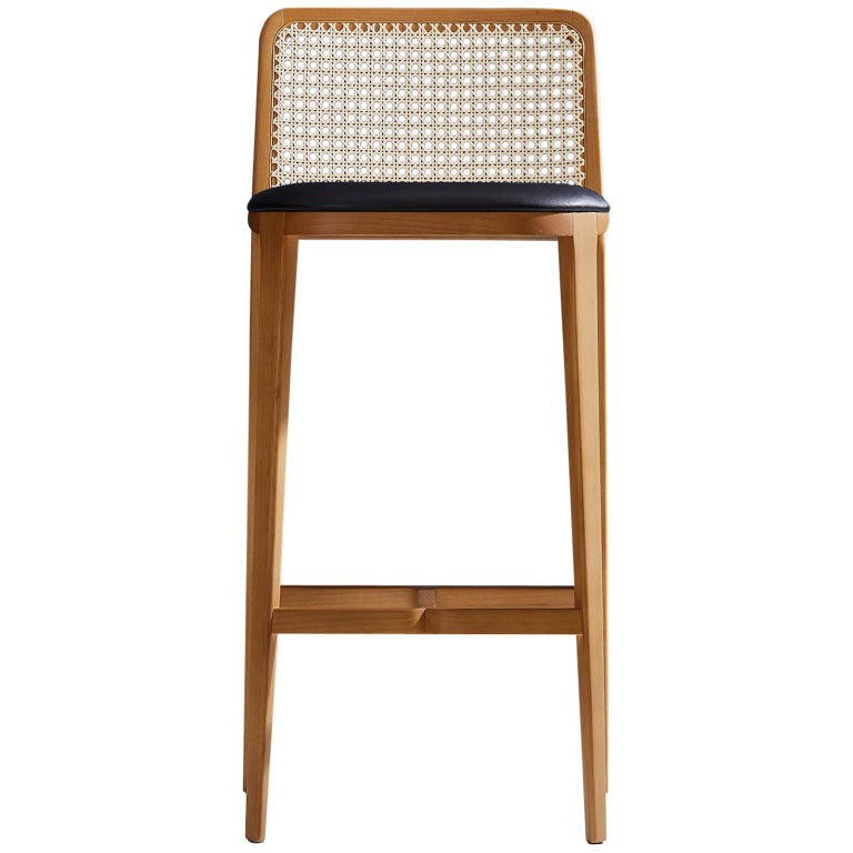 https://a.1stdibscdn.com/minimal-style-solid-wood-stool-bar-or-counter-hight-caning-and-leather-for-sale/1121189/f_197356321593856493573/19735632_master.jpg?width=768