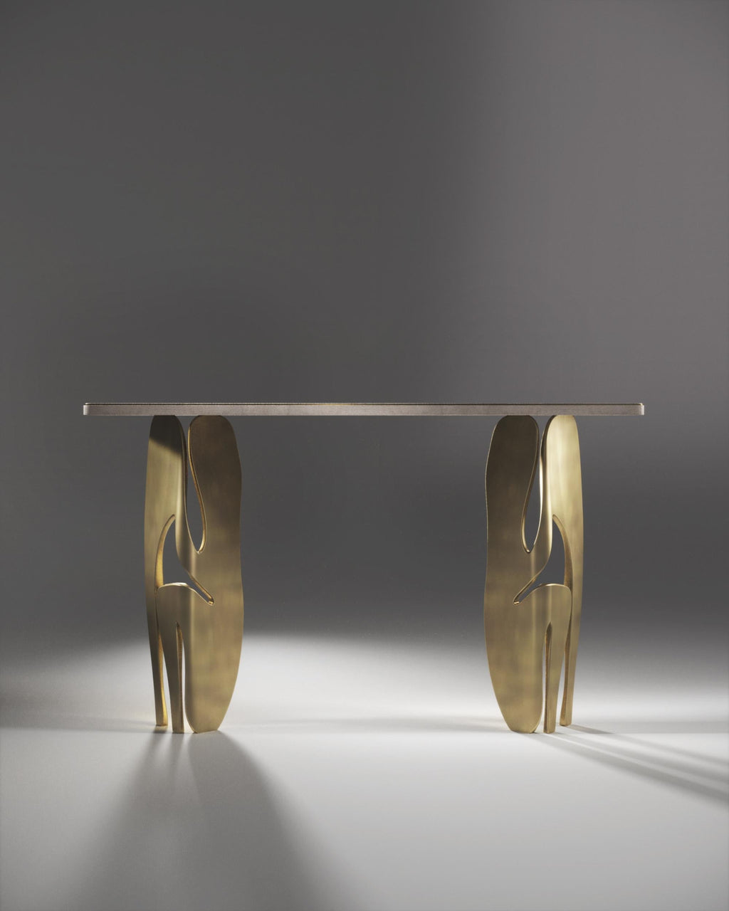 https://a.1stdibscdn.com/shagreen-breakfast-table-with-sculptural-brass-legs-by-r-y-augousti-for-sale-picture-14/f_45491/f_468498521759134738199/19_CONSOL_FRONT_master.jpeg