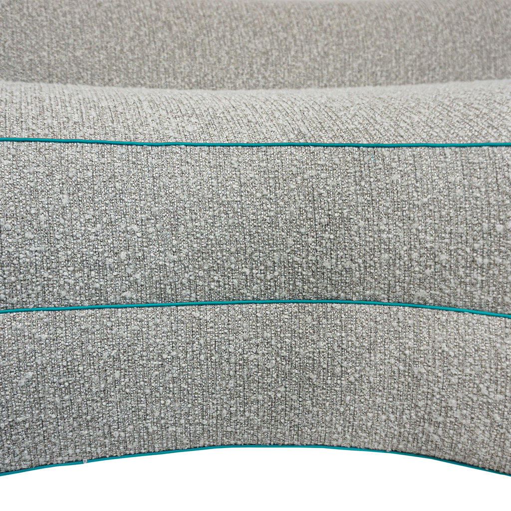 https://a.1stdibscdn.com/boucle-curved-sofa-with-turquoise-accents-for-sale-picture-15/f_21233/1622750912224/19_master.jpg