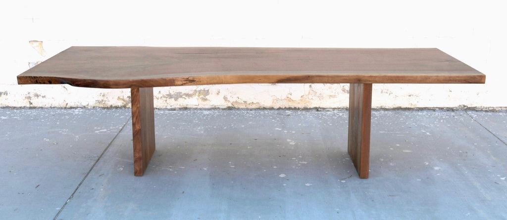 https://a.1stdibscdn.com/walnut-slab-live-edge-dining-table-custom-made-by-petersen-antiques-for-sale-picture-3/f_8065/1597847482538/1A9E16AF_66EE_4985_8936_F40193128026_master.jpeg