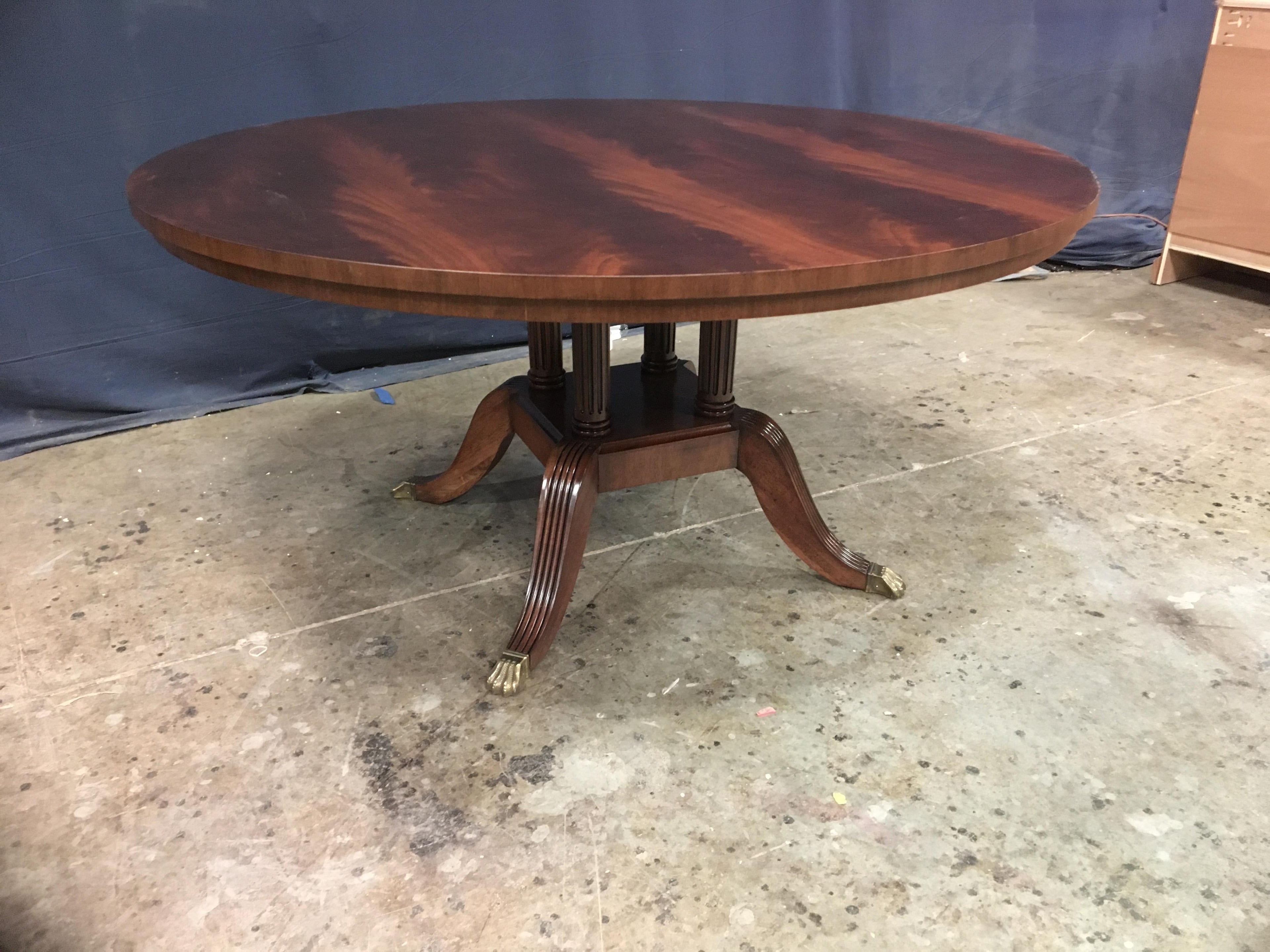 https://a.1stdibscdn.com/60-in-round-mahogany-georgian-style-pedestal-dining-table-by-leighton-hall-for-sale-picture-4/f_44162/f_227264821614449487111/1C202A6A_3F00_44AF_AE76_1A09F6826FC8_master.jpeg