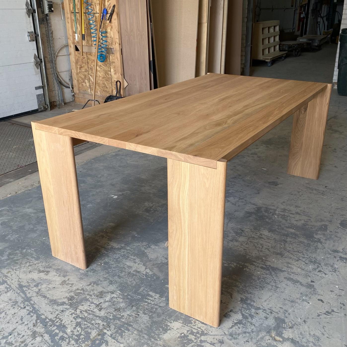 https://a.1stdibscdn.com/handcrafted-curtis-dining-table-solid-white-oak-120l-by-mary-ratcliffe-studio-for-sale-picture-4/f_77712/f_382323821706907608387/1D01E092_C7A0_4CCC_BB0E_3B399A43BBB7_master.jpeg
