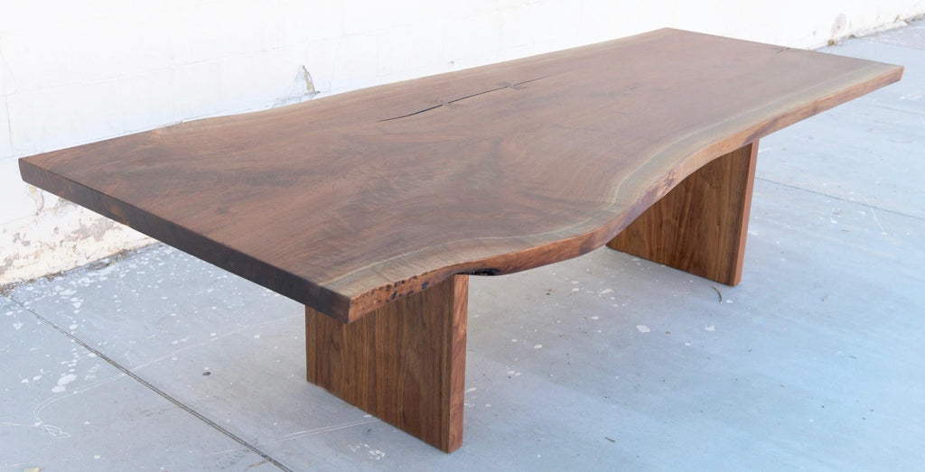 https://a.1stdibscdn.com/walnut-slab-live-edge-dining-table-custom-made-by-petersen-antiques-for-sale-picture-2/f_8065/1597847491604/1ED198E0_67D5_4789_9A88_972A1A38CD68_master.jpeg