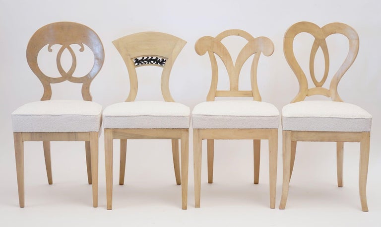 https://a.1stdibscdn.com/eclectica-set-of-8-white-biedermeier-dining-chairs-each-in-different-style-for-sale-picture-2/f_25683/f_461406221754336575140/1_ADX02911_master.jpeg?width=768