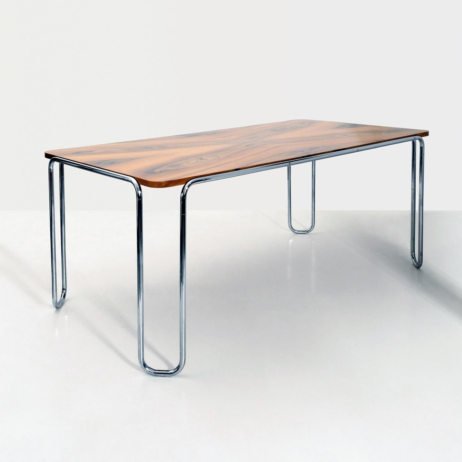 https://a.1stdibscdn.com/modernist-ultra-thin-tubular-steel-table-veneered-top-customisable-gmd-berlin-for-sale-picture-2/f_19723/f_271179221652801338823/1_MODERN_XX_GMD_Berlin_Stahlrohr_Schlaufentisch_Tubular_steel_table_master.jpg