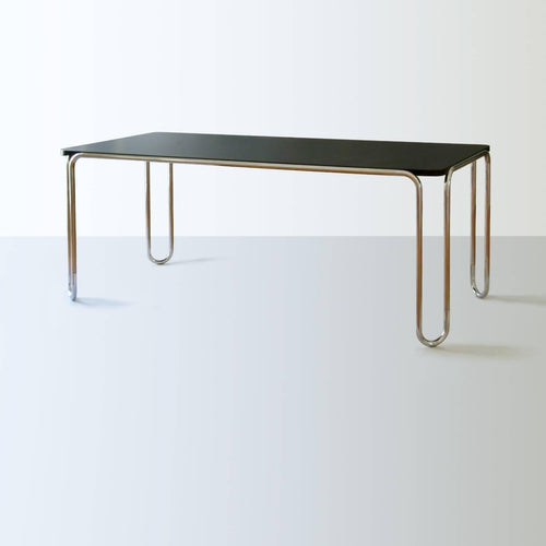 https://a.1stdibscdn.com/modernist-ultra-thin-table-chrome-plated-steel-veneered-wood-customizable-for-sale-picture-2/f_19723/f_466172821757584233663/1_MODERN_XX_GMD_Berlin_Stahlrohr_Schlaufentisch_Tubular_steel_table_master.jpg