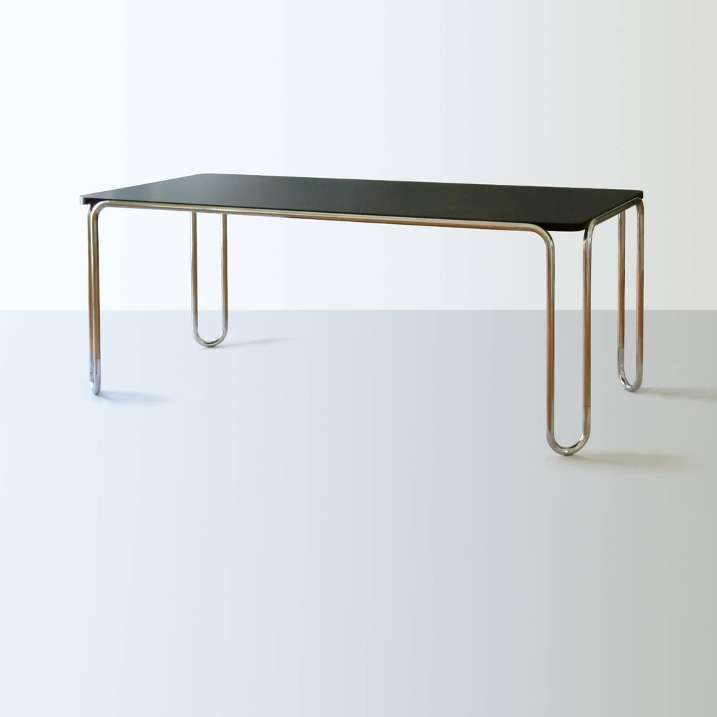 https://a.1stdibscdn.com/modernist-ultra-thin-table-chrome-plated-steel-veneered-wood-customizable-for-sale-picture-2/f_19723/f_466172821757584233663/1_MODERN_XX_GMD_Berlin_Stahlrohr_Schlaufentisch_Tubular_steel_table_master.jpg