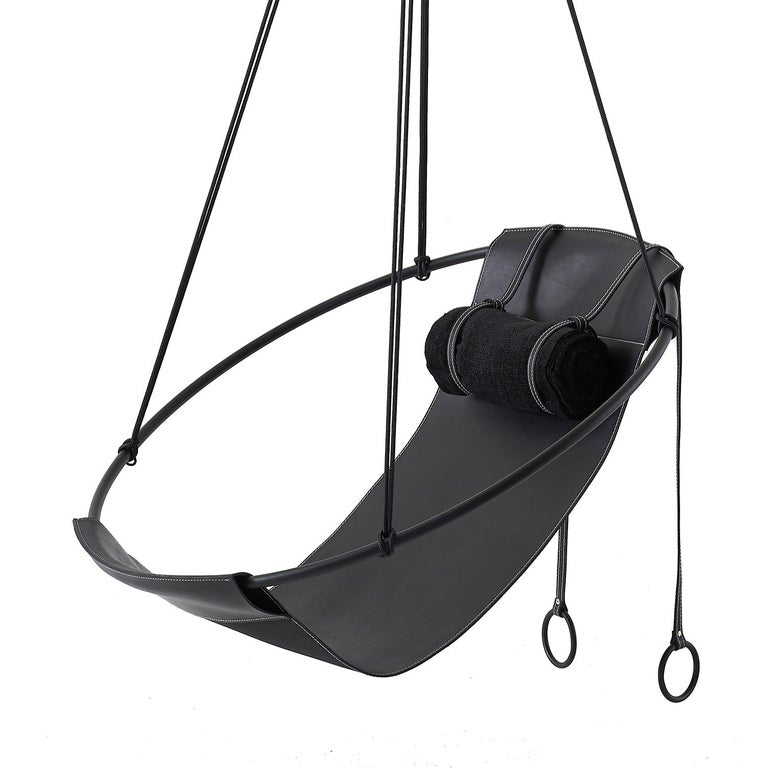 https://a.1stdibscdn.com/sling-hanging-swing-chair-genuine-black-leather-21st-century-modern-for-sale-picture-2/f_32773/f_95536231610228535002/1_Sling_Black_with_Bolster_DE_master.jpg?width=768