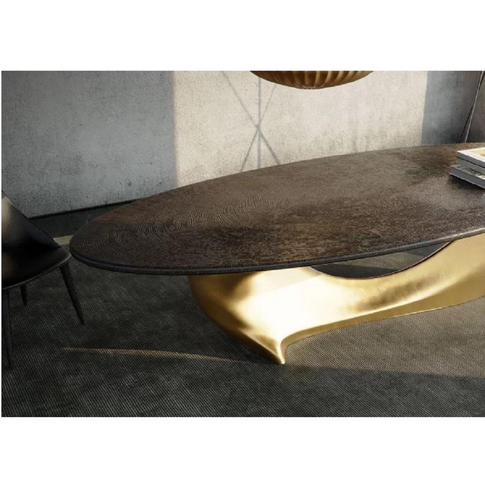 https://a.1stdibscdn.com/sculptural-oval-dining-table-with-organic-monumental-base-in-bronze-finish-for-sale-picture-7/f_27693/f_478402221764914869801/1_master.jpg