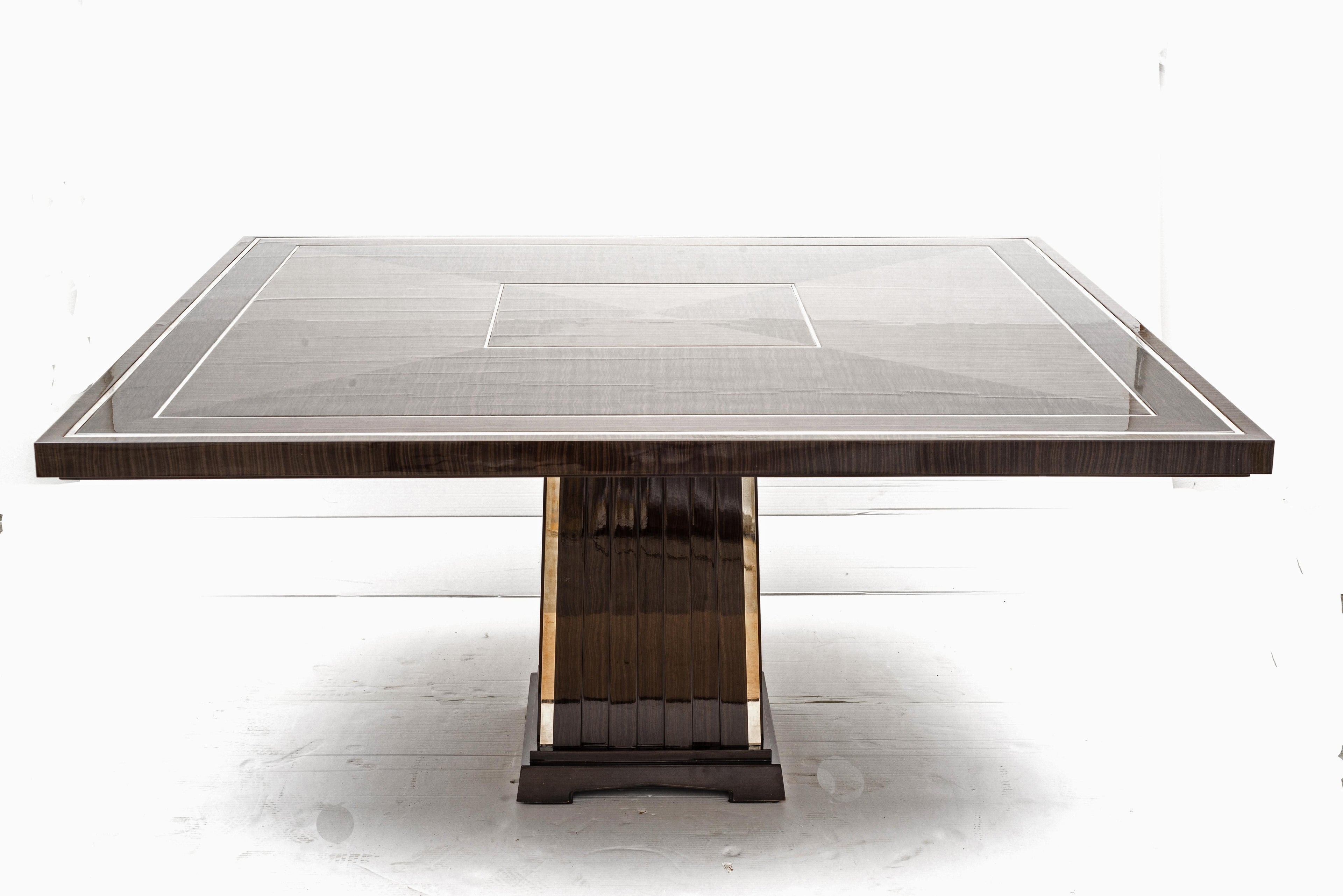 https://a.1stdibscdn.com/art-deco-style-important-dining-room-table-veneer-wood-top-and-chrome-inserts-for-sale-picture-11/f_9859/f_207354321601055006091/1_master.jpg