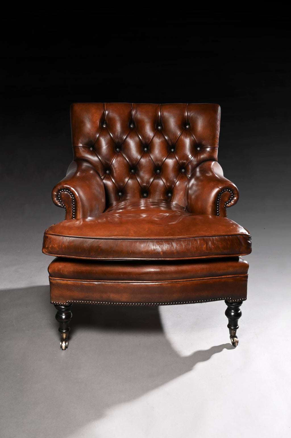 https://a.1stdibscdn.com/leather-upholstered-buttoned-back-armchair-for-sale-picture-2/f_11832/f_239683621622289398650/1_master.jpg
