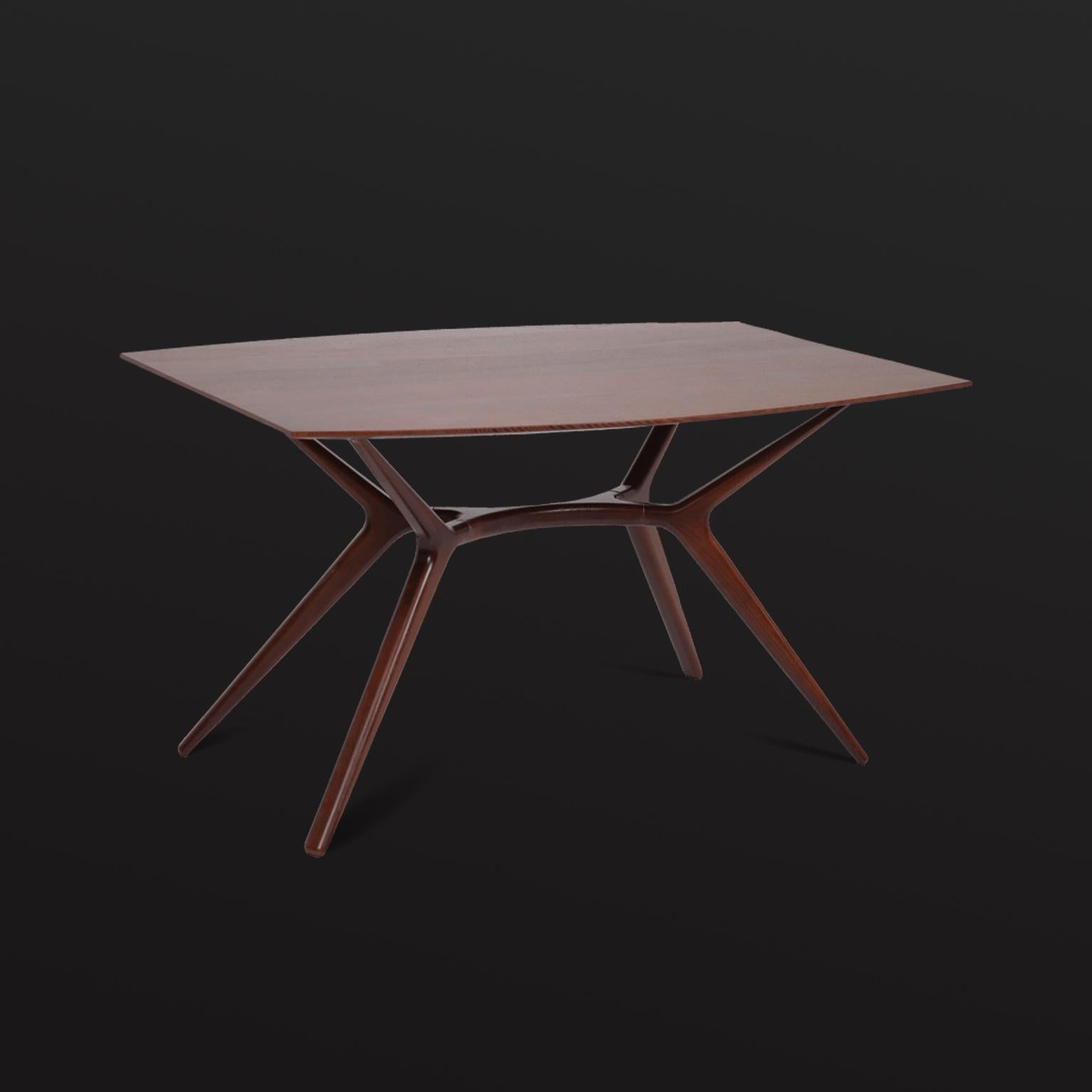 https://a.1stdibscdn.com/mid-century-modern-wooden-dining-table-in-walnut-for-sale-picture-7/f_55202/f_288897421653979387464/1stDibs_MCM_5_master.jpg