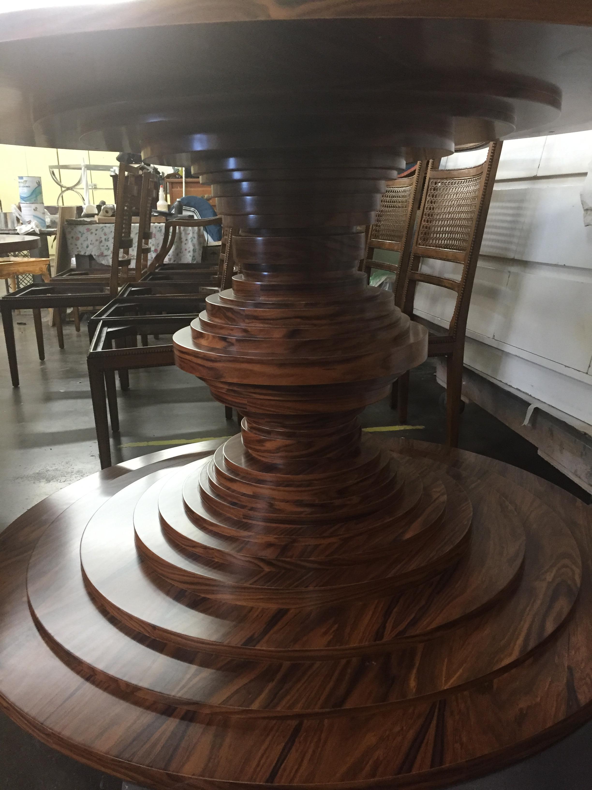https://a.1stdibscdn.com/walnut-vega-dining-table-with-stacked-discs-for-sale-picture-4/f_54442/f_24750992/2017_11_14_14_16_1627930655700_master.jpg