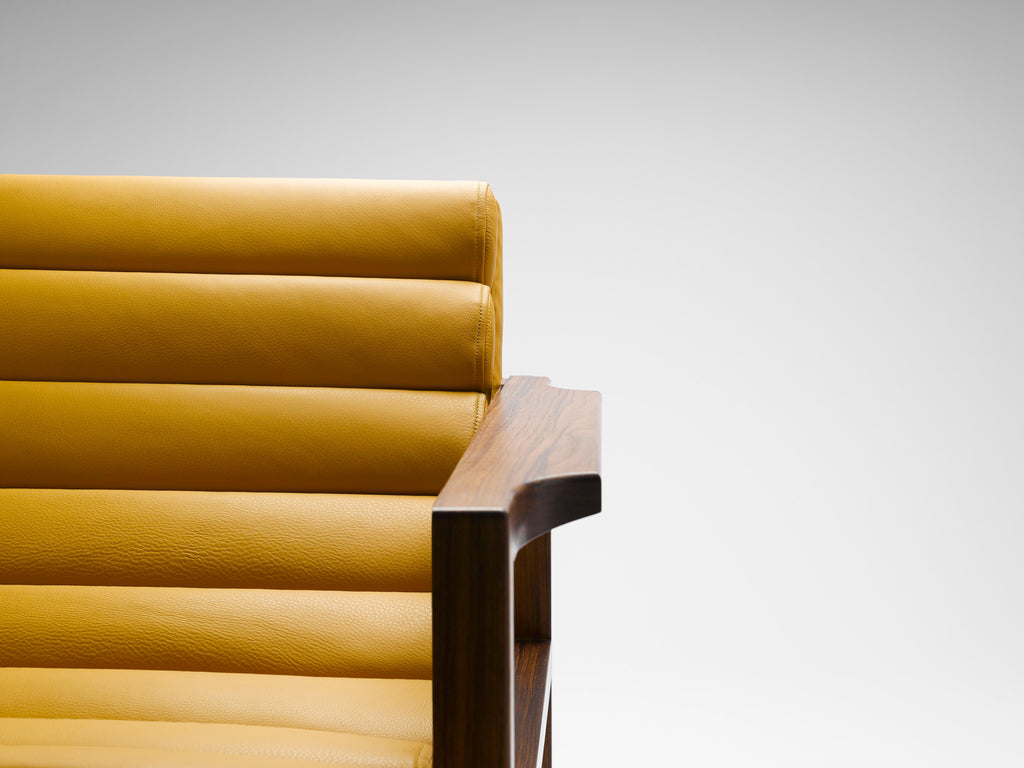 https://a.1stdibscdn.com/contemporary-channeled-florence-easy-chair-in-yellow-leather-and-walnut-frame-for-sale-picture-5/f_27813/f_435994421764581760566/2018_6_7_the_florence_easy_chair10750_8bf_master.jpg