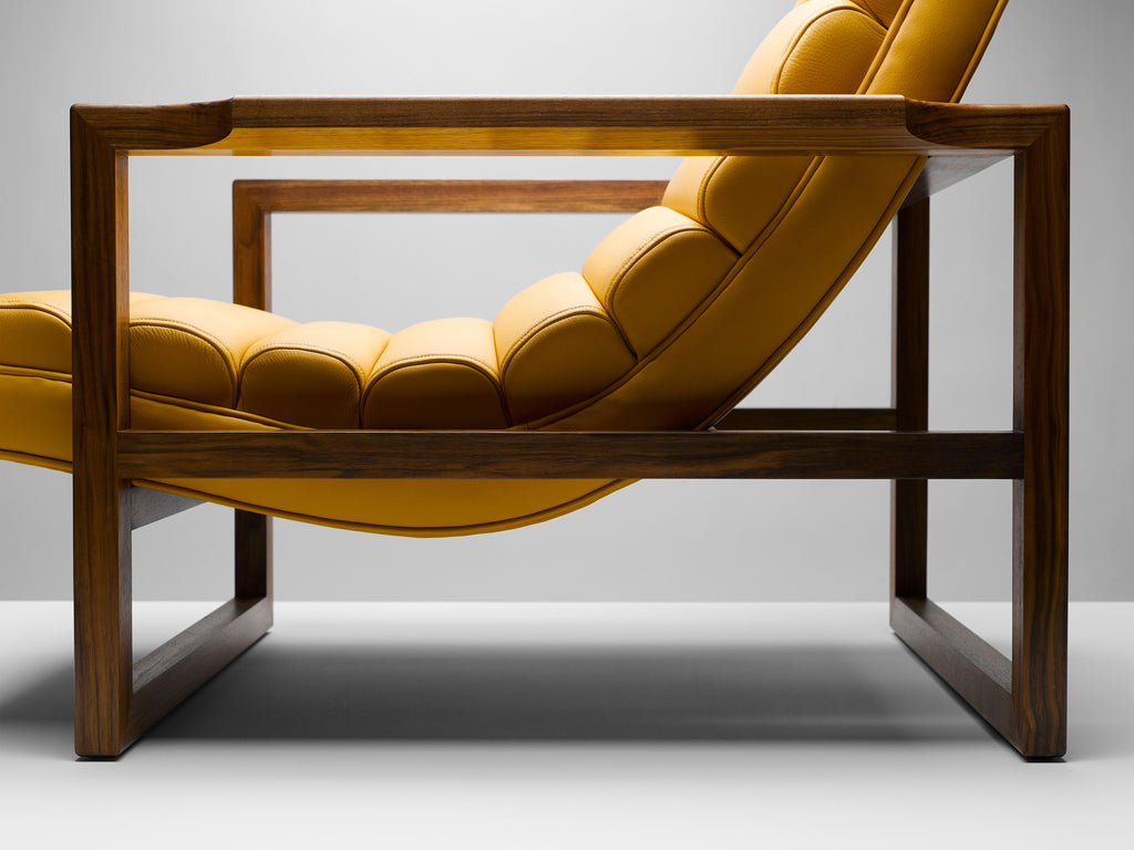https://a.1stdibscdn.com/contemporary-channeled-florence-easy-chair-in-yellow-leather-and-walnut-frame-for-sale-picture-4/f_27813/f_435994421764581760631/2018_6_7_the_florence_easy_chair10777_8bf_master.jpg