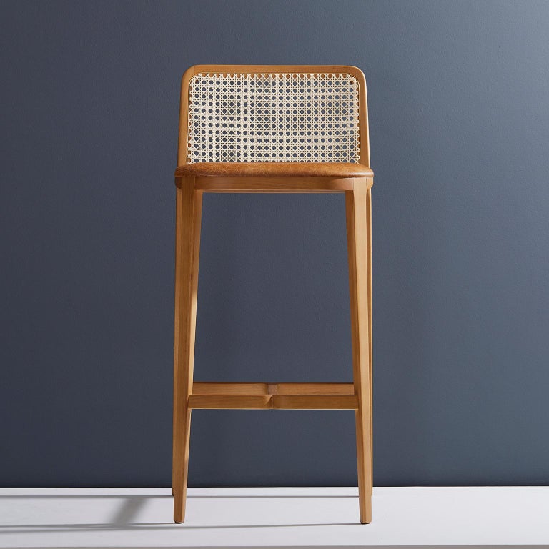 https://a.1stdibscdn.com/minimal-style-solid-wood-stool-bar-or-counter-hight-caning-and-leather-for-sale-picture-5/f_35593/f_197356321593808015903/2019_05_30_Emporio_DanielSimonini_0183_master.jpg?width=768