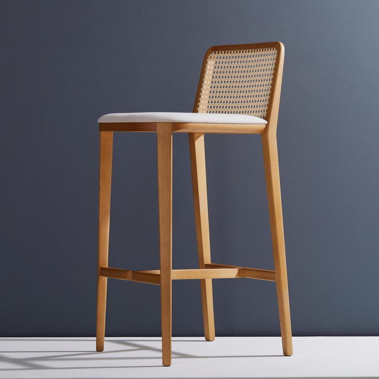 https://a.1stdibscdn.com/minimal-style-solid-wood-stool-textiles-or-leather-seatings-caning-backboard-for-sale-picture-7/f_35593/f_191783521590178578462/2019_05_30_Emporio_DanielSimonini_0185_master.jpg?width=768