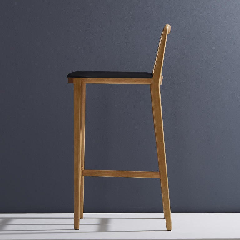 https://a.1stdibscdn.com/minimal-style-solid-wood-stool-bar-or-counter-hight-caning-and-leather-for-sale-picture-4/f_35593/f_197356321593808657823/2019_05_30_Emporio_DanielSimonini_0186_master.jpg?width=768