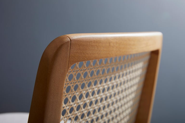 https://a.1stdibscdn.com/minimal-style-solid-wood-stool-bar-or-counter-hight-caning-and-leather-for-sale-picture-8/f_35593/f_197159821593719876169/2019_05_30_Emporio_DanielSimonini_0192_master.jpg?width=768