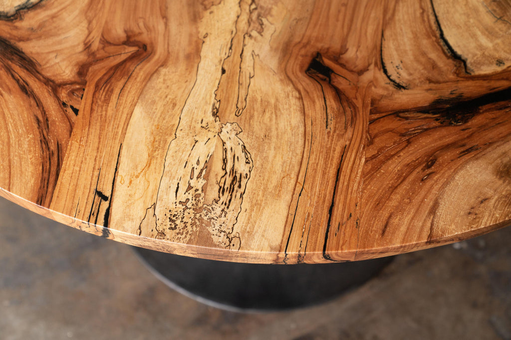 https://a.1stdibscdn.com/round-pedestal-base-dining-table-solid-pecan-wood-top-on-hand-cast-tulip-base-for-sale-picture-5/f_43982/f_203742621598633940299/2020_38_7R3_0098_3000px_master.jpg