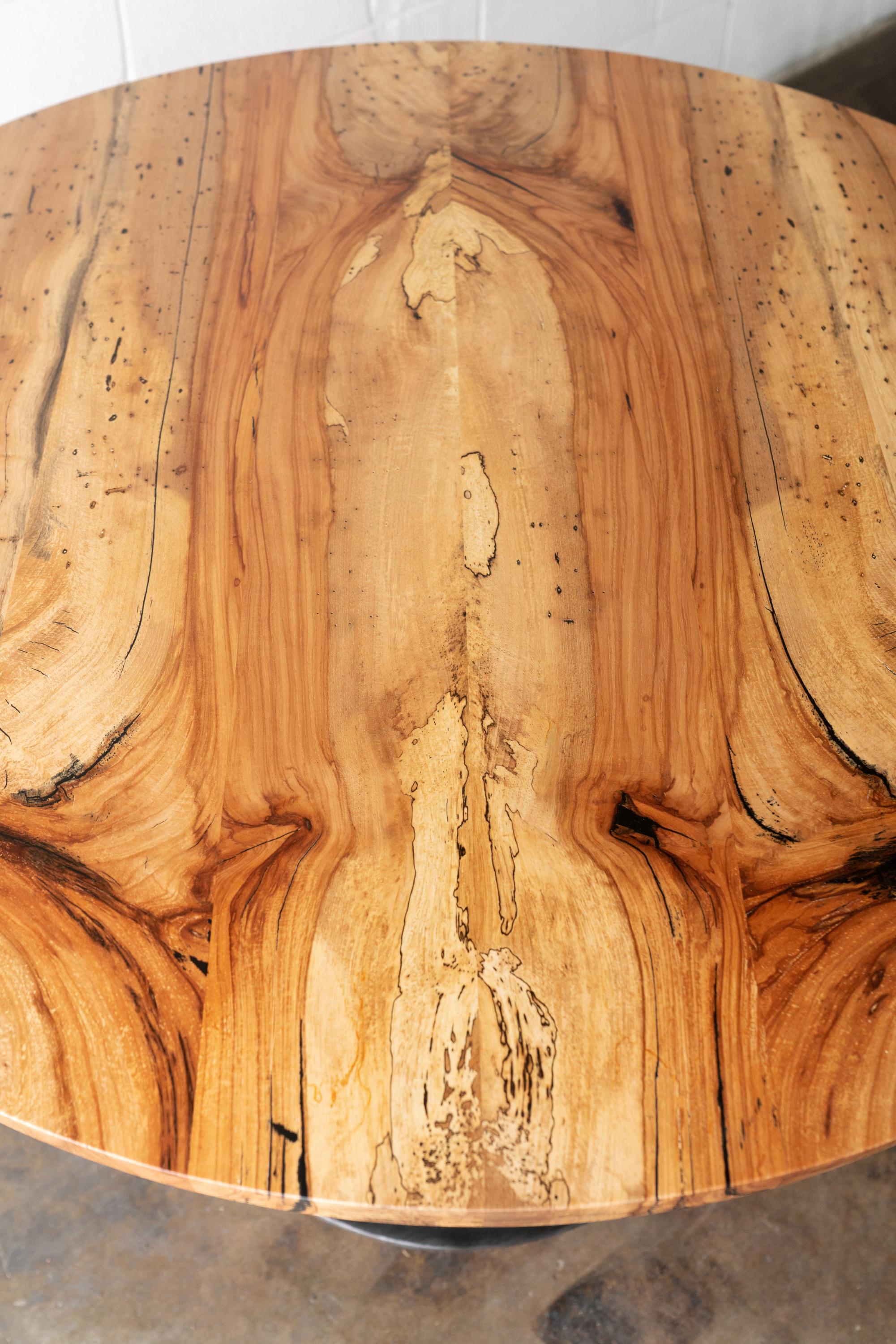 https://a.1stdibscdn.com/round-pedestal-base-dining-table-solid-pecan-wood-top-on-hand-cast-tulip-base-for-sale-picture-6/f_43982/f_203742621598633945180/2020_38_7R3_0104_3000px_master.jpg