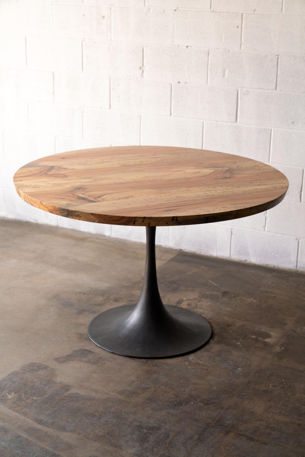 https://a.1stdibscdn.com/round-pedestal-base-dining-table-solid-pecan-wood-top-on-hand-cast-tulip-base-for-sale-picture-2/f_43982/f_203742621598633951948/2020_38_7R3_0137_3000px_master.jpg