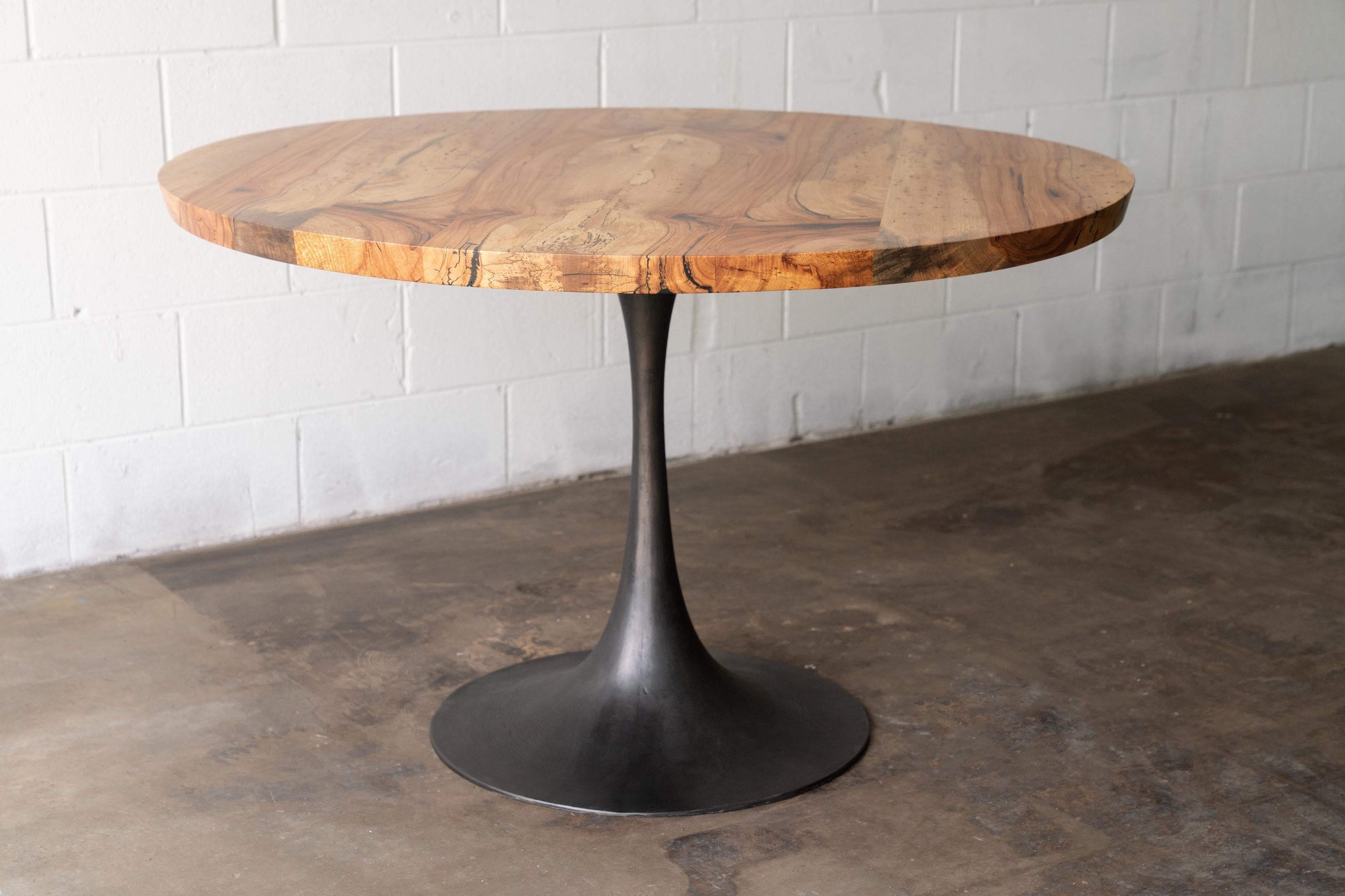 https://a.1stdibscdn.com/round-pedestal-base-dining-table-solid-pecan-wood-top-on-hand-cast-tulip-base-for-sale-picture-9/f_43982/f_203742621598633953839/2020_38_7R3_0146_3000px_master.jpg