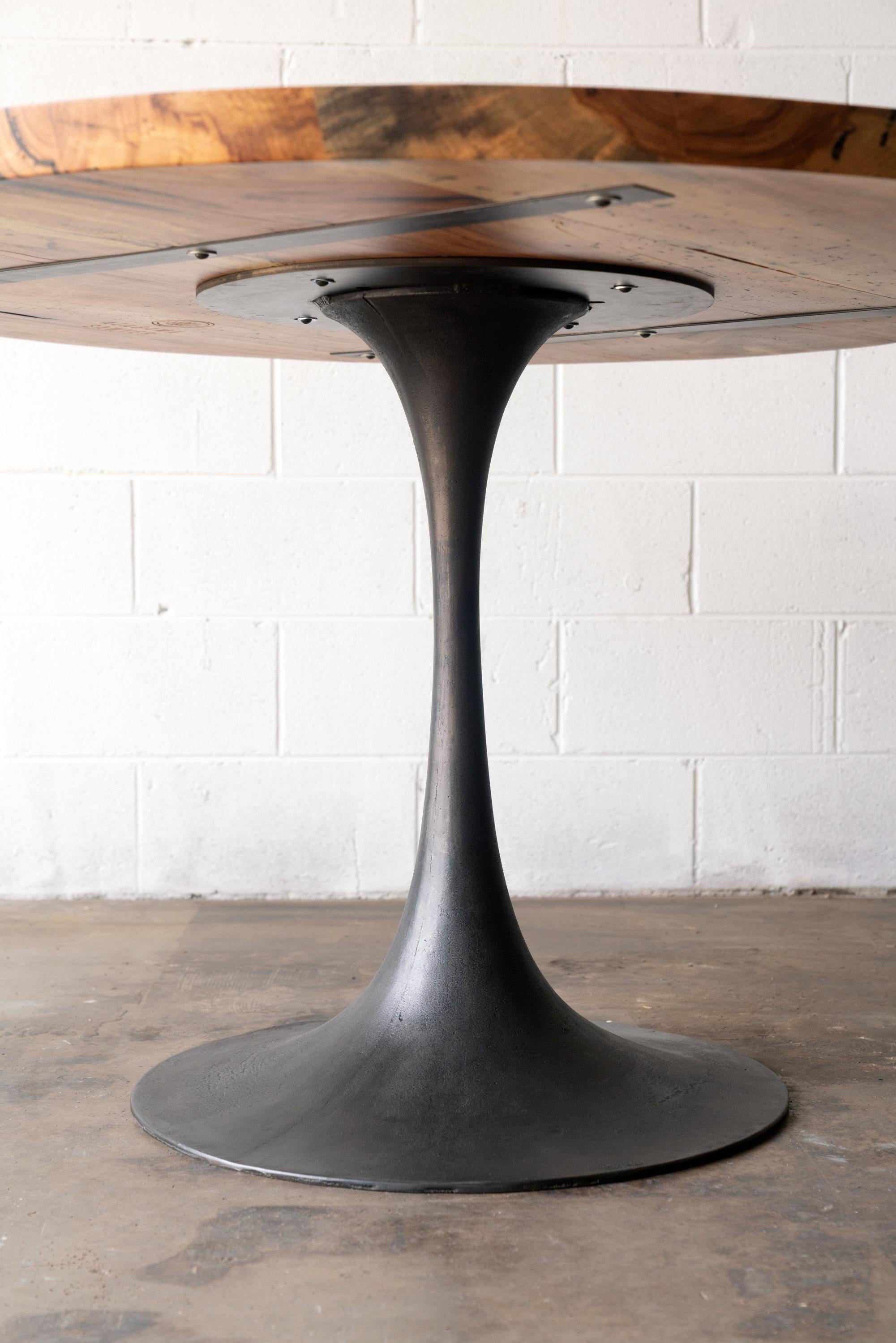 https://a.1stdibscdn.com/round-pedestal-base-dining-table-solid-pecan-wood-top-on-hand-cast-tulip-base-for-sale-picture-10/f_43982/f_203742621598633955847/2020_38_7R3_0150_3000px_master.jpg