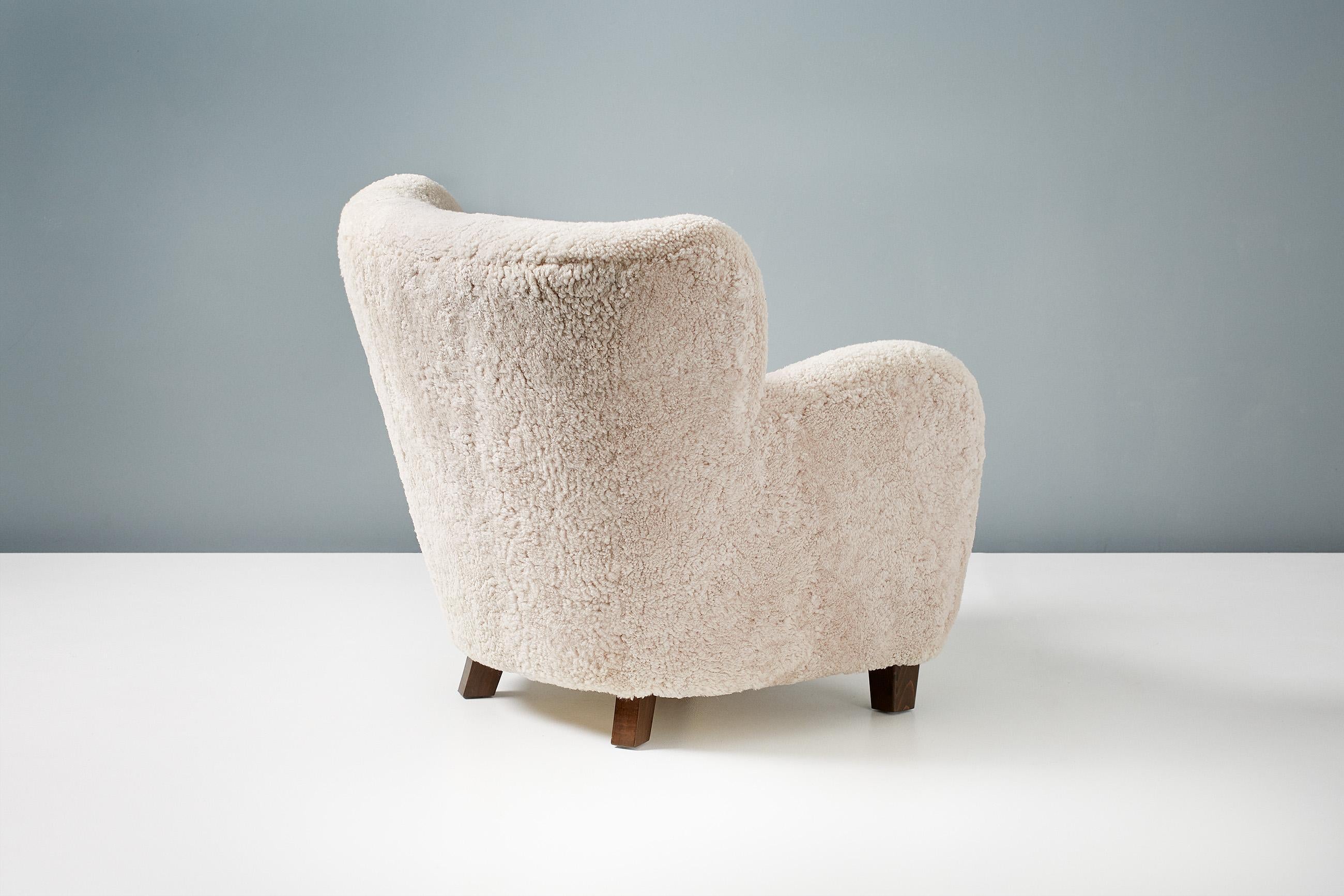 https://a.1stdibscdn.com/custom-made-karu-armchair-for-sale-picture-6/f_13332/f_251539921630592288302/20210506_DagmarLondon_Batch_590850_r1_srgb_master.jpg