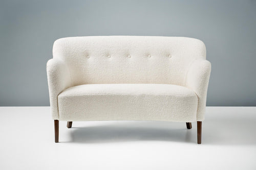 https://a.1stdibscdn.com/slagelse-mobelvaerk-1950s-curved-boucle-sofa-for-sale-picture-2/f_13332/f_256193721633554457418/20210903_DagmarLondon_Batch_063_094_r1_srgb_master.jpg