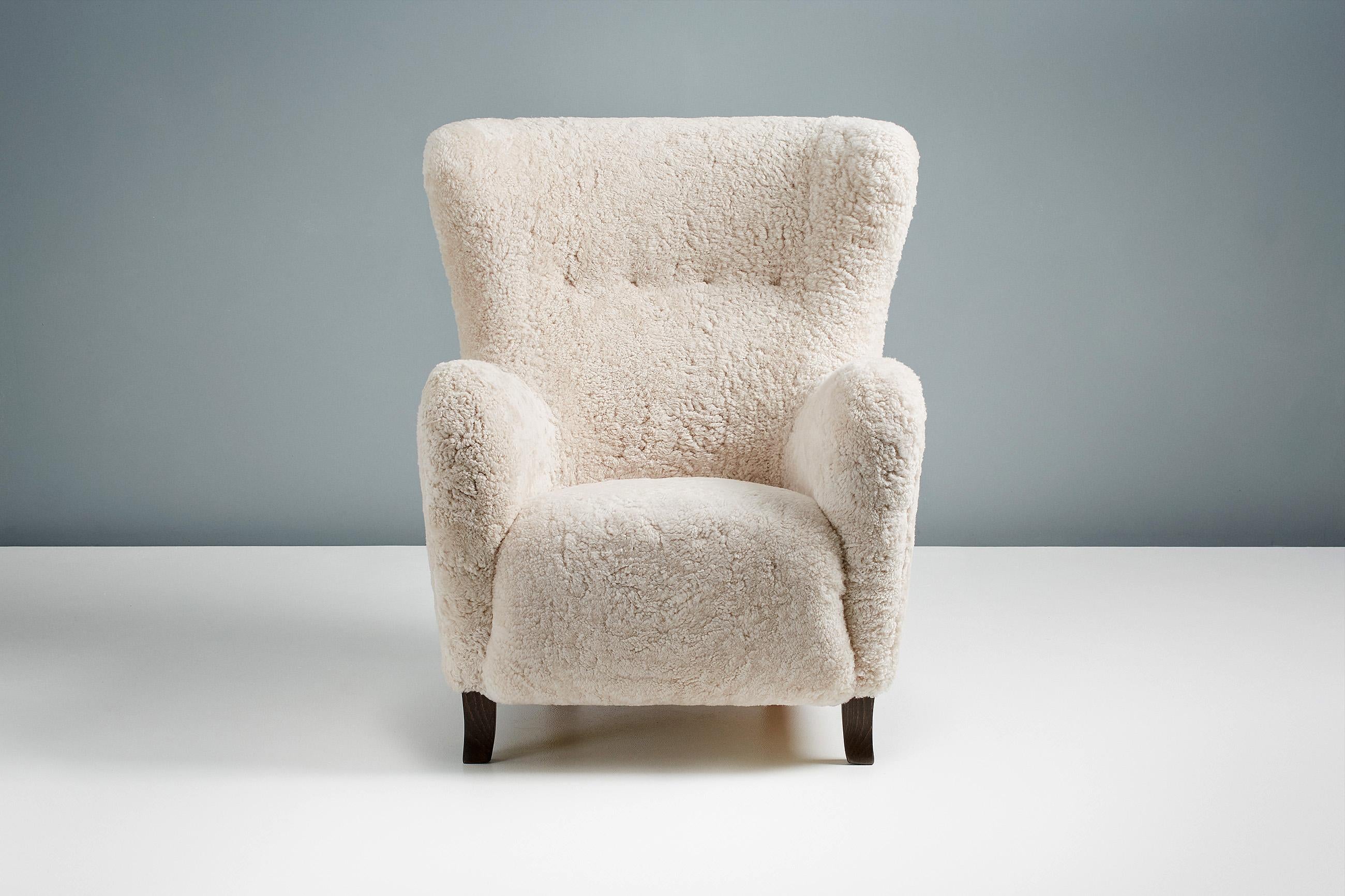 https://a.1stdibscdn.com/custom-made-sampo-sheepskin-wing-chair-for-sale-picture-2/f_67442/f_306415521664530880113/20211011_Dagmar_Batch_0640125_r1_srgb_master.jpg
