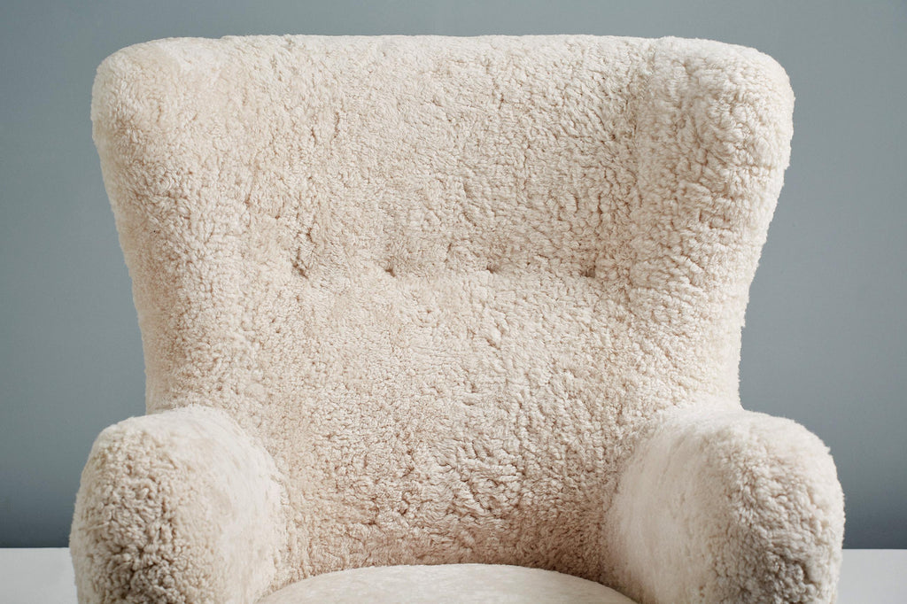 https://a.1stdibscdn.com/sheepskin-sampo-chair-ottoman-for-sale-picture-8/f_13332/f_362756921695381899641/20211011_Dagmar_Batch_0640126_r1_srgb_master.jpg