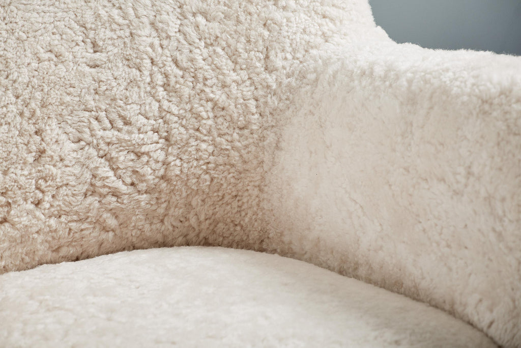 https://a.1stdibscdn.com/sheepskin-sampo-chair-ottoman-for-sale-picture-9/f_13332/f_362756921695381900627/20211011_Dagmar_Batch_0640130_r1_srgb_master.jpg