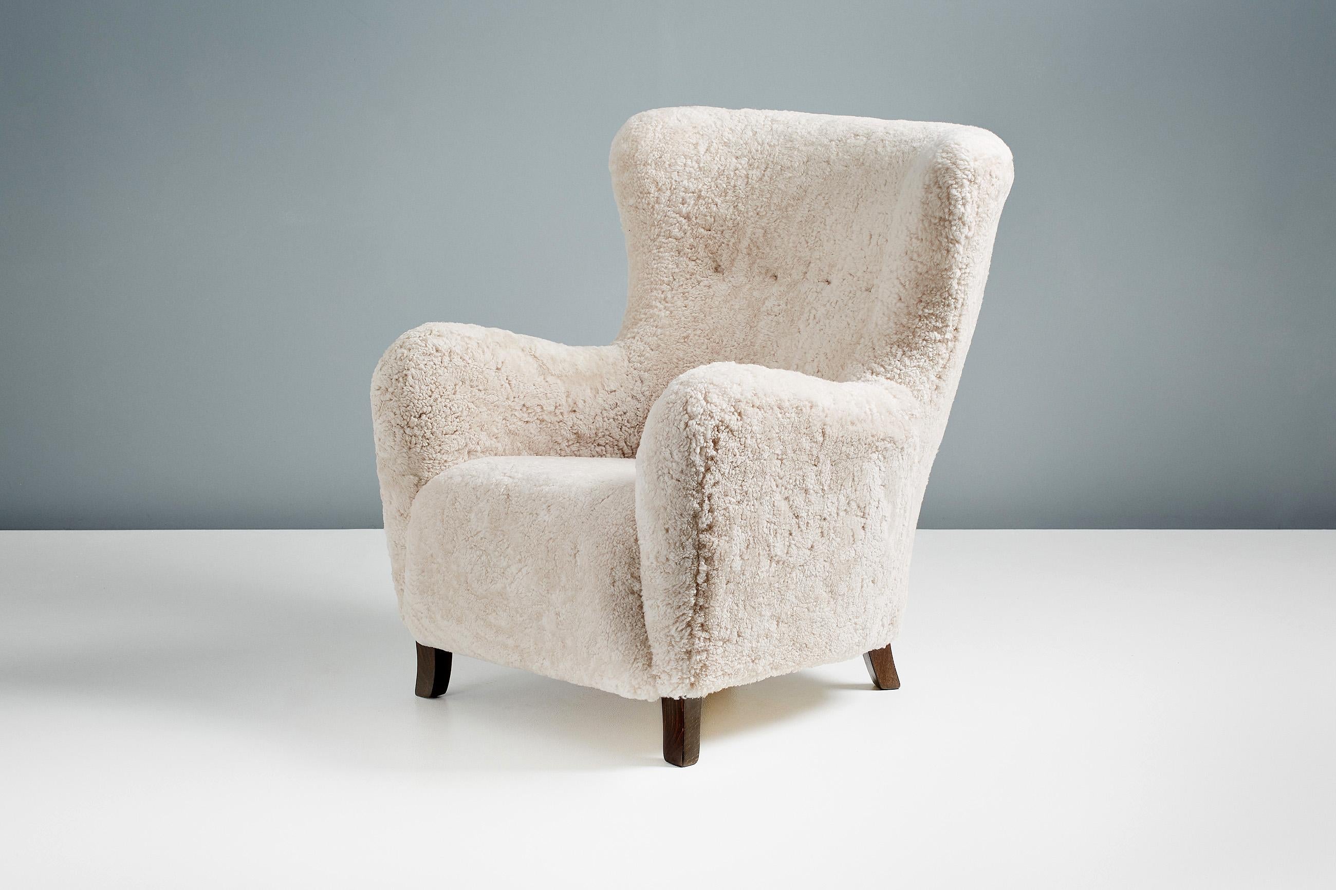 https://a.1stdibscdn.com/custom-made-sampo-sheepskin-wing-chair-for-sale-picture-5/f_67442/f_306415521664530883456/20211011_Dagmar_Batch_0640132_r1_srgb_master.jpg