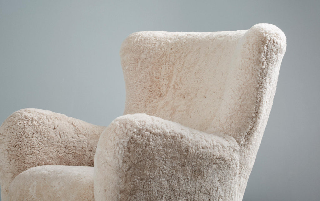 https://a.1stdibscdn.com/sheepskin-sampo-chair-ottoman-for-sale-picture-10/f_13332/f_362756921695381901852/20211011_Dagmar_Batch_0640136_r1_srgb_master.jpg