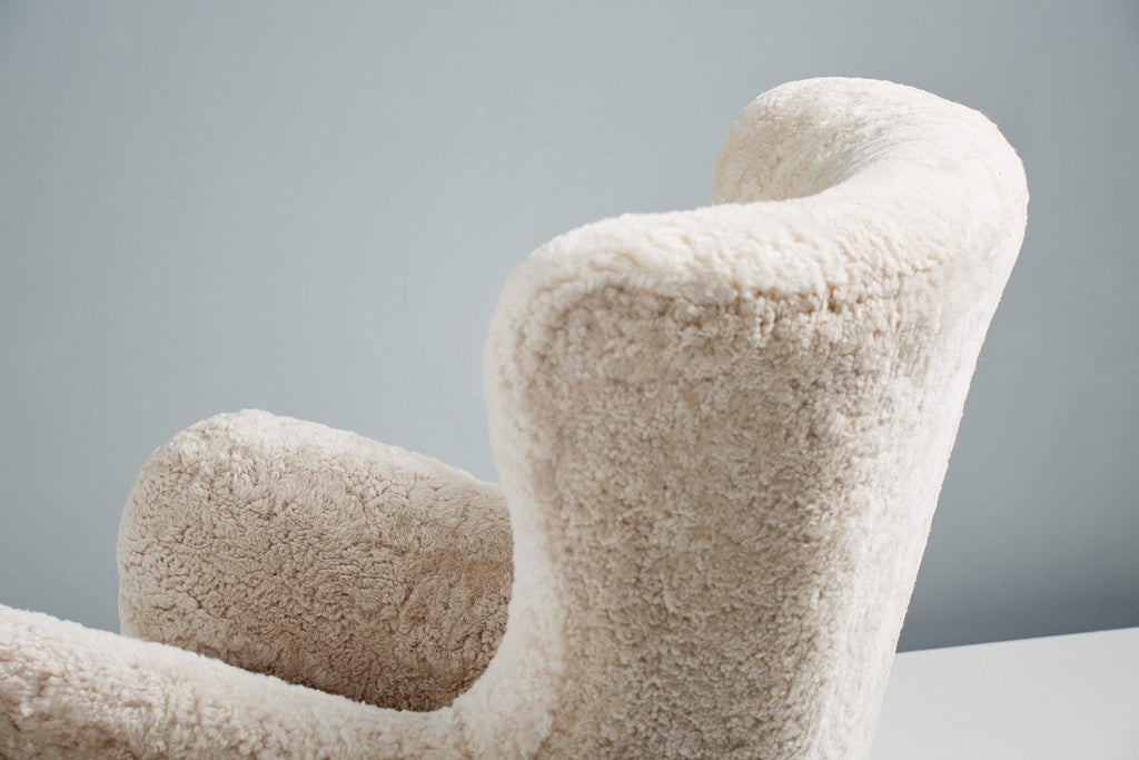 https://a.1stdibscdn.com/sheepskin-sampo-chair-ottoman-for-sale-picture-12/f_13332/f_362756921695381904029/20211011_Dagmar_Batch_0640143_r1_srgb_master.jpg