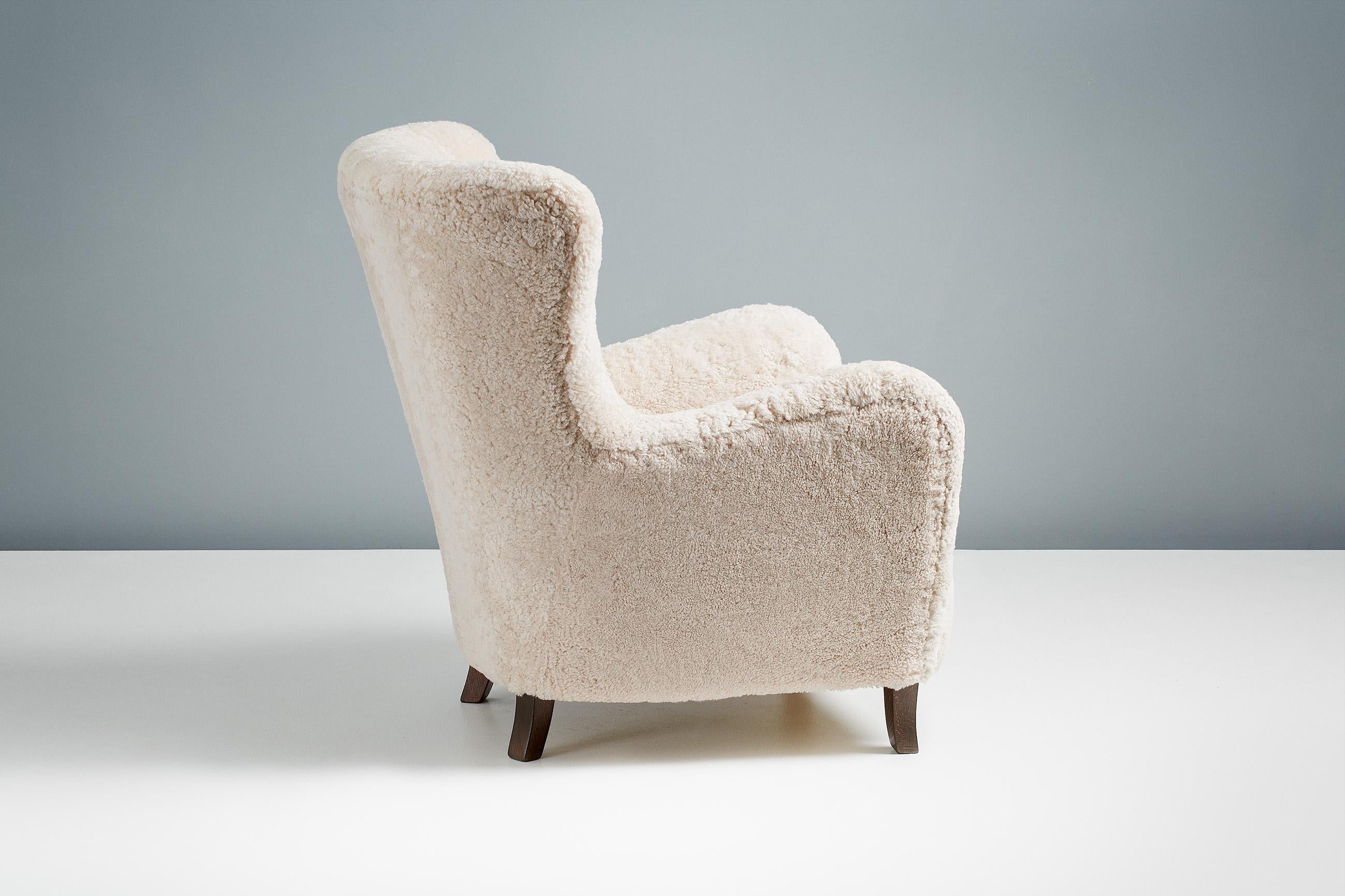 https://a.1stdibscdn.com/custom-made-sampo-sheepskin-wing-chair-for-sale-picture-9/f_67442/f_306415521664530885685/20211011_Dagmar_Batch_0640150_r1_srgb_master.jpg