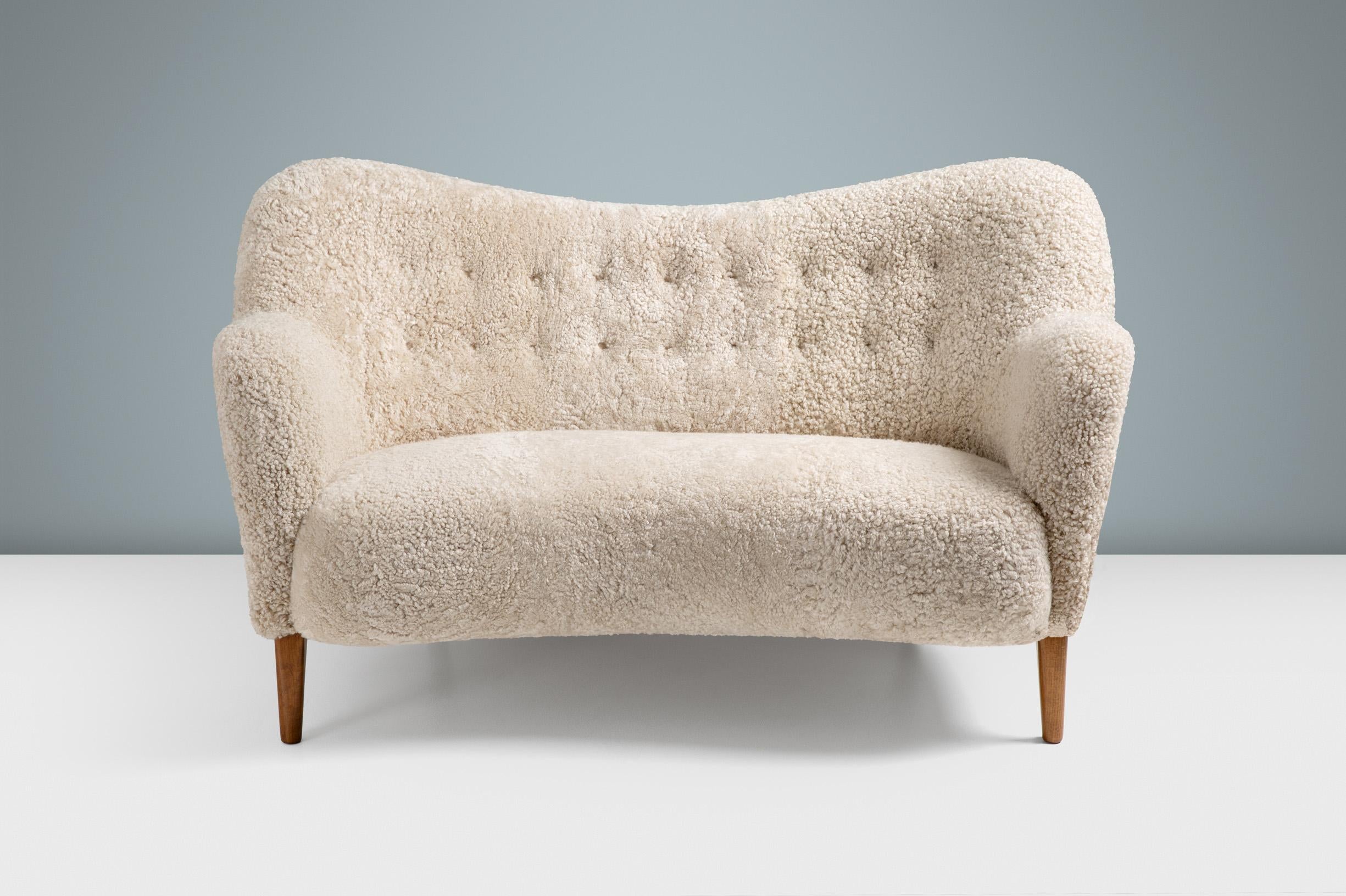 https://a.1stdibscdn.com/custom-made-sheepskin-love-seat-sofa-by-alfred-kristensen-for-sale-picture-2/f_67442/f_387294521710887046307/20211011_Dagmar_Batch_0640749_1_master.jpg