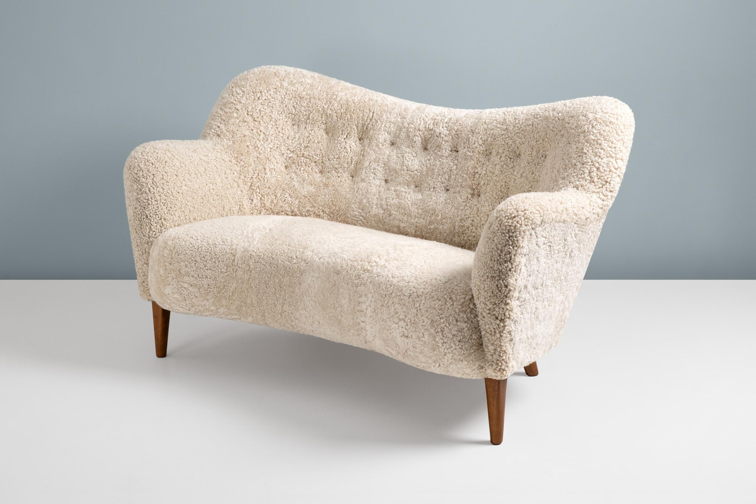 https://a.1stdibscdn.com/custom-made-sheepskin-love-seat-sofa-by-alfred-kristensen-for-sale-picture-3/f_67442/f_387294521710887007336/20211011_Dagmar_Batch_0640756_1_master.jpg
