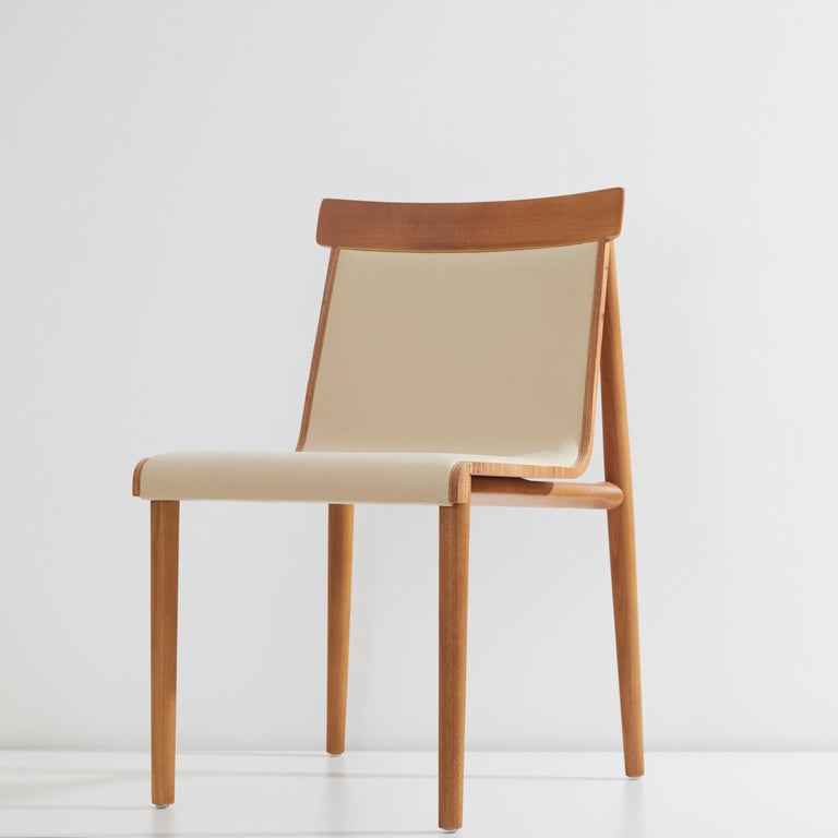 https://a.1stdibscdn.com/contemporary-chair-in-solid-wood-upholstered-in-leather-or-textiles-with-arms-for-sale-picture-12/f_35593/f_245291721626355933599/2021_07_01_DanielSimonini_102_master.jpg?width=768
