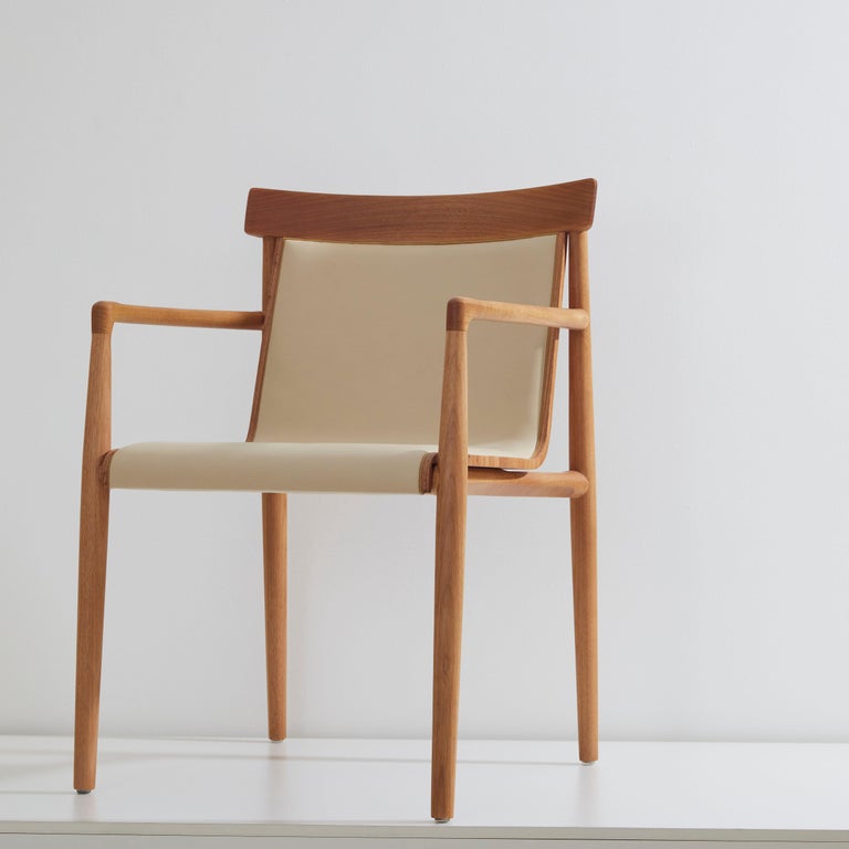https://a.1stdibscdn.com/contemporary-chair-in-solid-wood-upholstered-in-leather-or-textiles-with-arms-for-sale-picture-2/f_35593/f_245291721626356622563/2021_07_01_DanielSimonini_127_master.jpg?width=768
