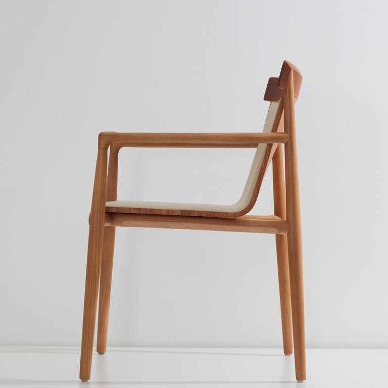 https://a.1stdibscdn.com/contemporary-chair-in-solid-wood-upholstered-in-leather-or-textiles-with-arms-for-sale-picture-5/f_35593/f_245291721626356631311/2021_07_01_DanielSimonini_129_master.jpg?width=768